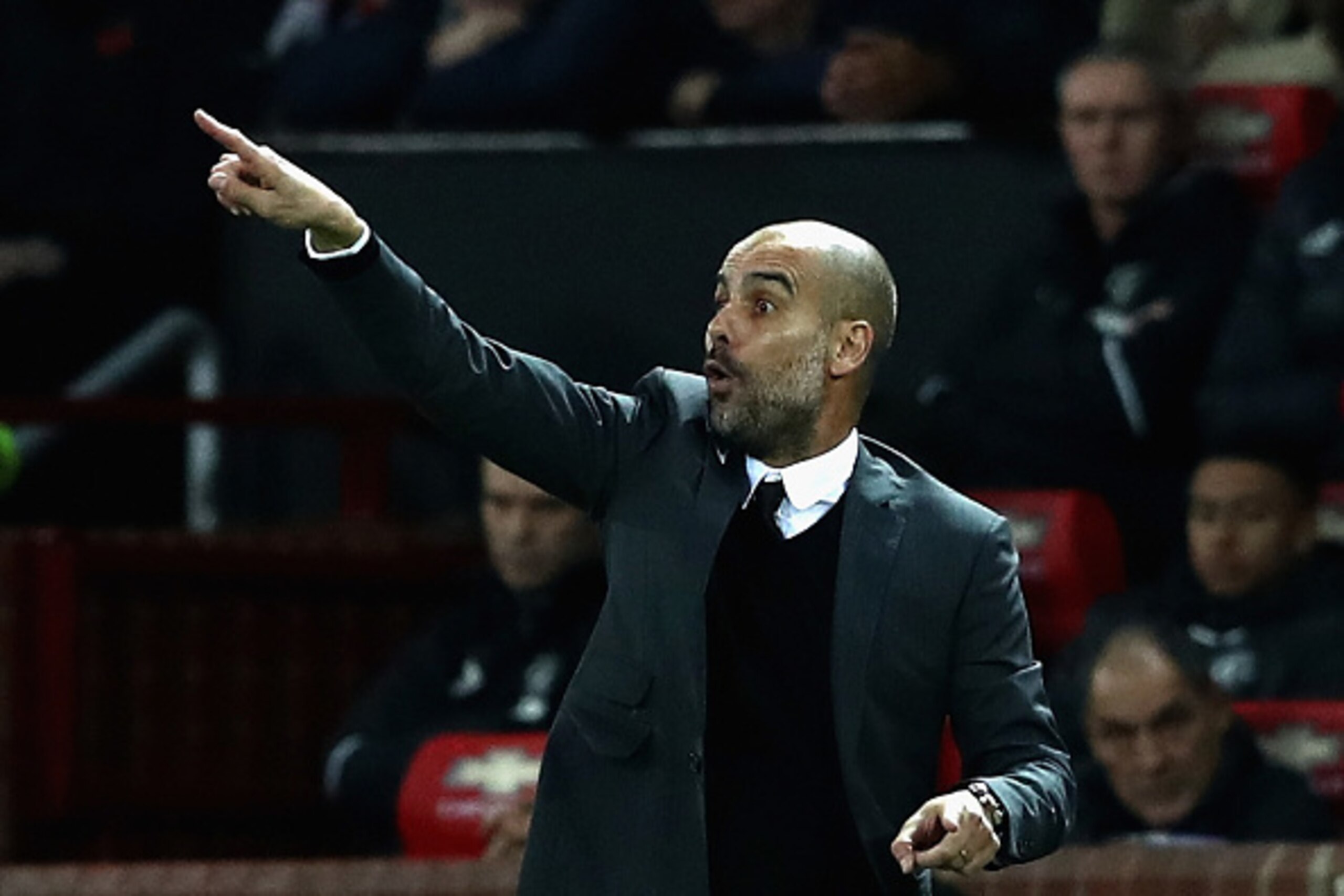 MANCHESTER, ENGLAND - OCTOBER 26:  Josep Guardiola, Manager of Manchester City gives his team instructions during the EFL Cup Fourth Round match between Manchester United and Manchester City at Old Trafford on October 26, 2016 in Manchester, England.  (Ph