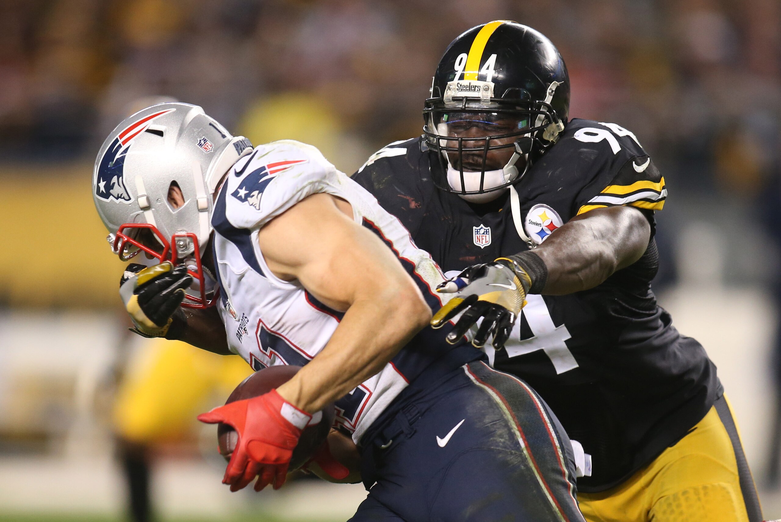 Oct 23, 2016; Pittsburgh, PA, USA; New England Patriots wide receiver Julian Edelman (11)is  tackled after a catch by Pittsburgh Steelers linebacker Lawrence Timmons (94) during the fourth quarter at Heinz Field. New England won 27-16. Mandatory Credit: C