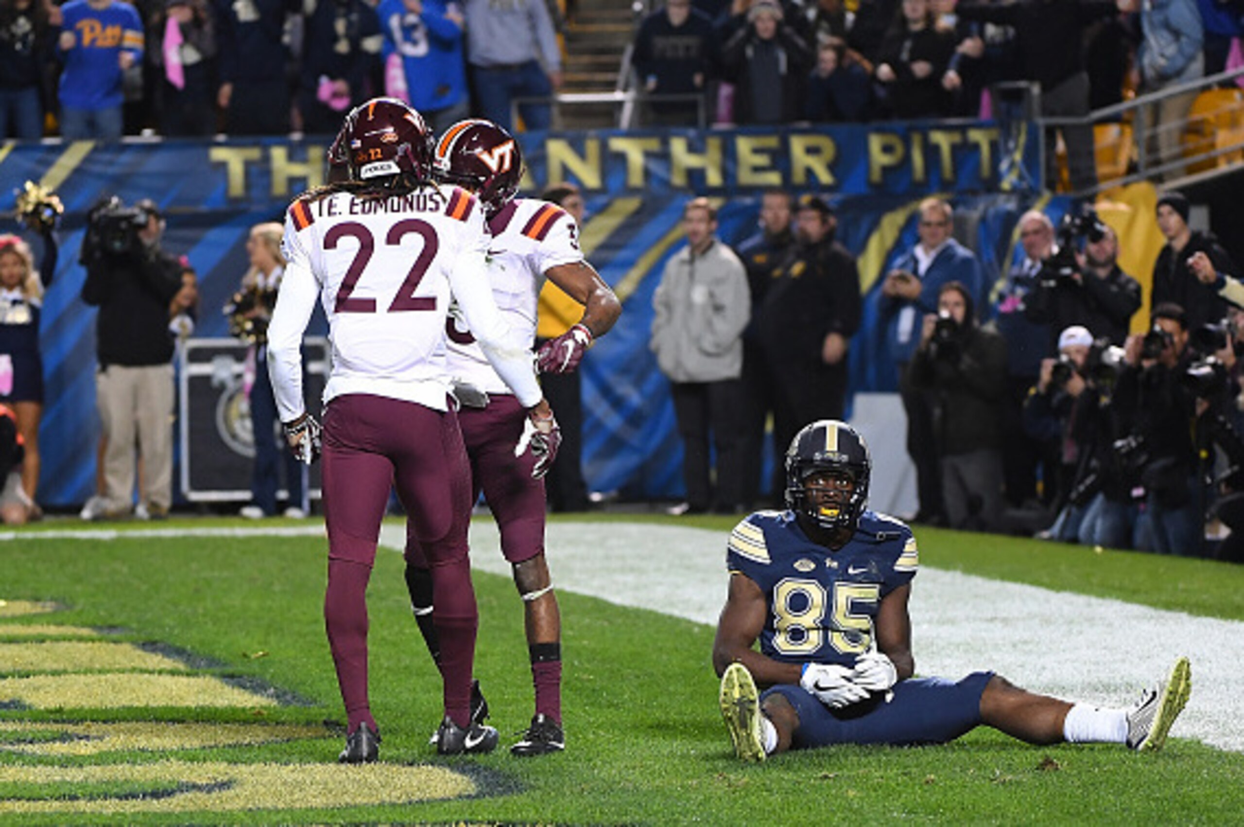 PITTSBURGH, PA - OCTOBER 27:  Jester Weah #85 of the Pittsburgh Panthers sits on the ground as Terrell Edmunds #22 and Greg Stroman #3 of the Virginia Tech Hokies celebrate a defensive play in the second quarter during the game at Heinz Field on October 2