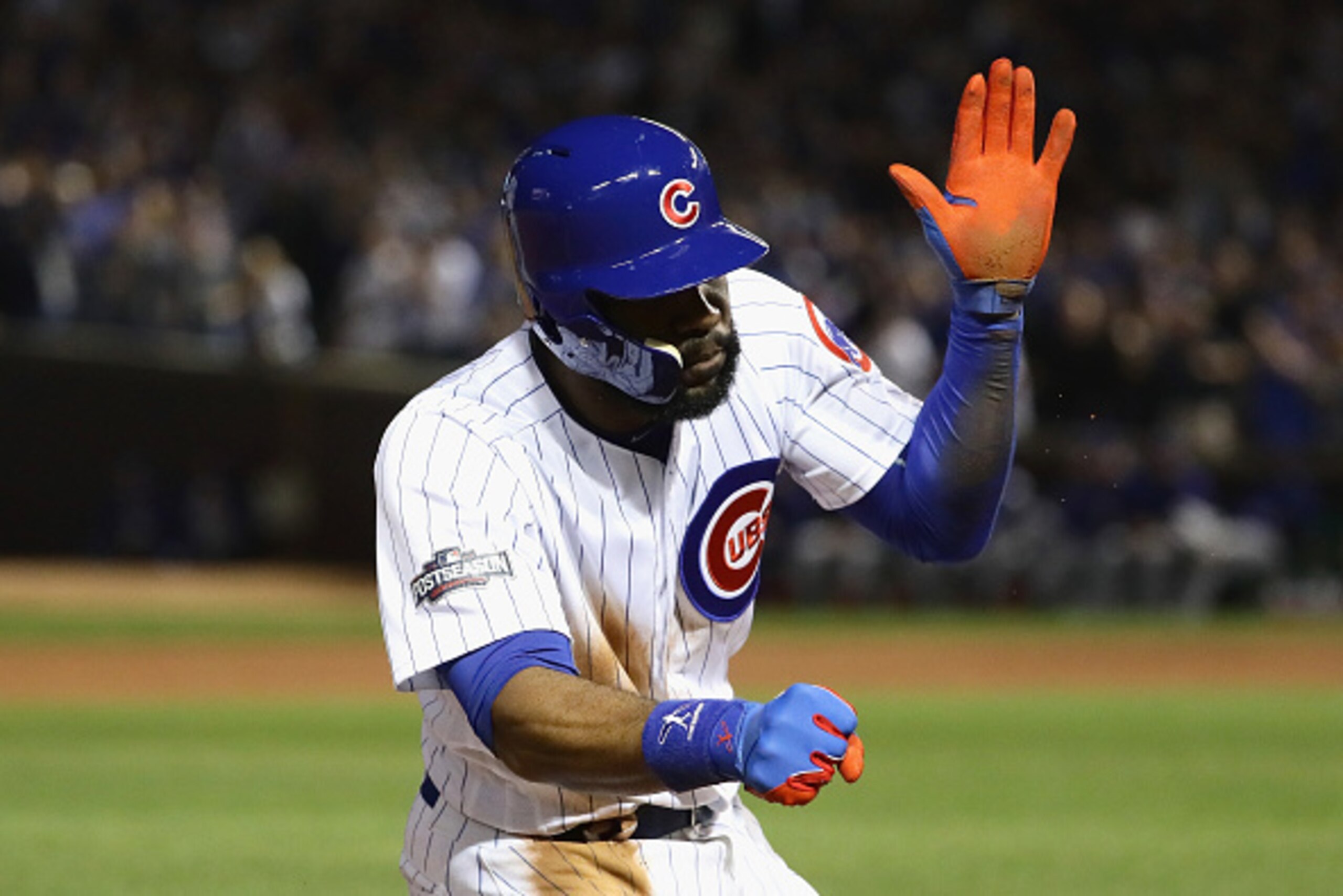 CHICAGO, IL - OCTOBER 15:  Jason Heyward #22 of the Chicago Cubs reacts after hitting a triple in the second inning against the Los Angeles Dodgers during game one of the National League Championship Series at Wrigley Field on October 15, 2016 in Chicago,