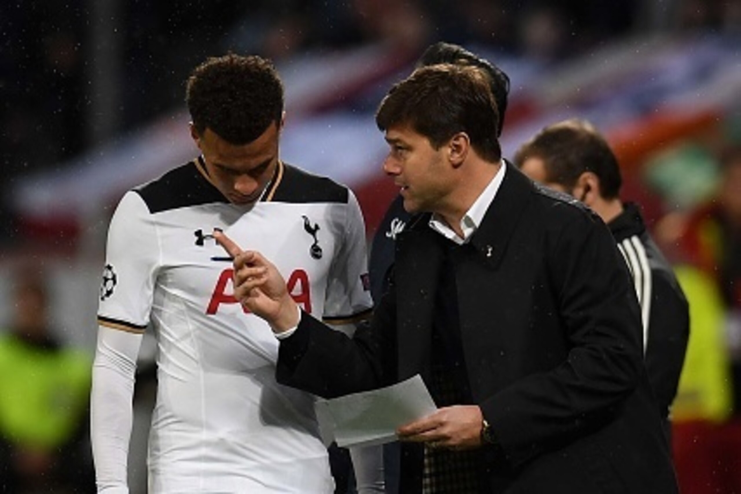 Tottenham Hotspur's Argentinian head coach Mauricio Pochettino (R) talks to Tottenham Hotspur's English midfielder Dele Alli during the Champions League group E football match between Bayer Leverkusen and Tottenham Hotspur in Leverkusen, western Germany, Tottenham Hotspur's Argentinian head coach Mauricio Pochettino (R) talks to Tottenham Hotspur's English midfielder Dele Alli during the Champions League group E football match between Bayer Leverkusen and Tottenham Hotspur in Leverkusen, western Germany,