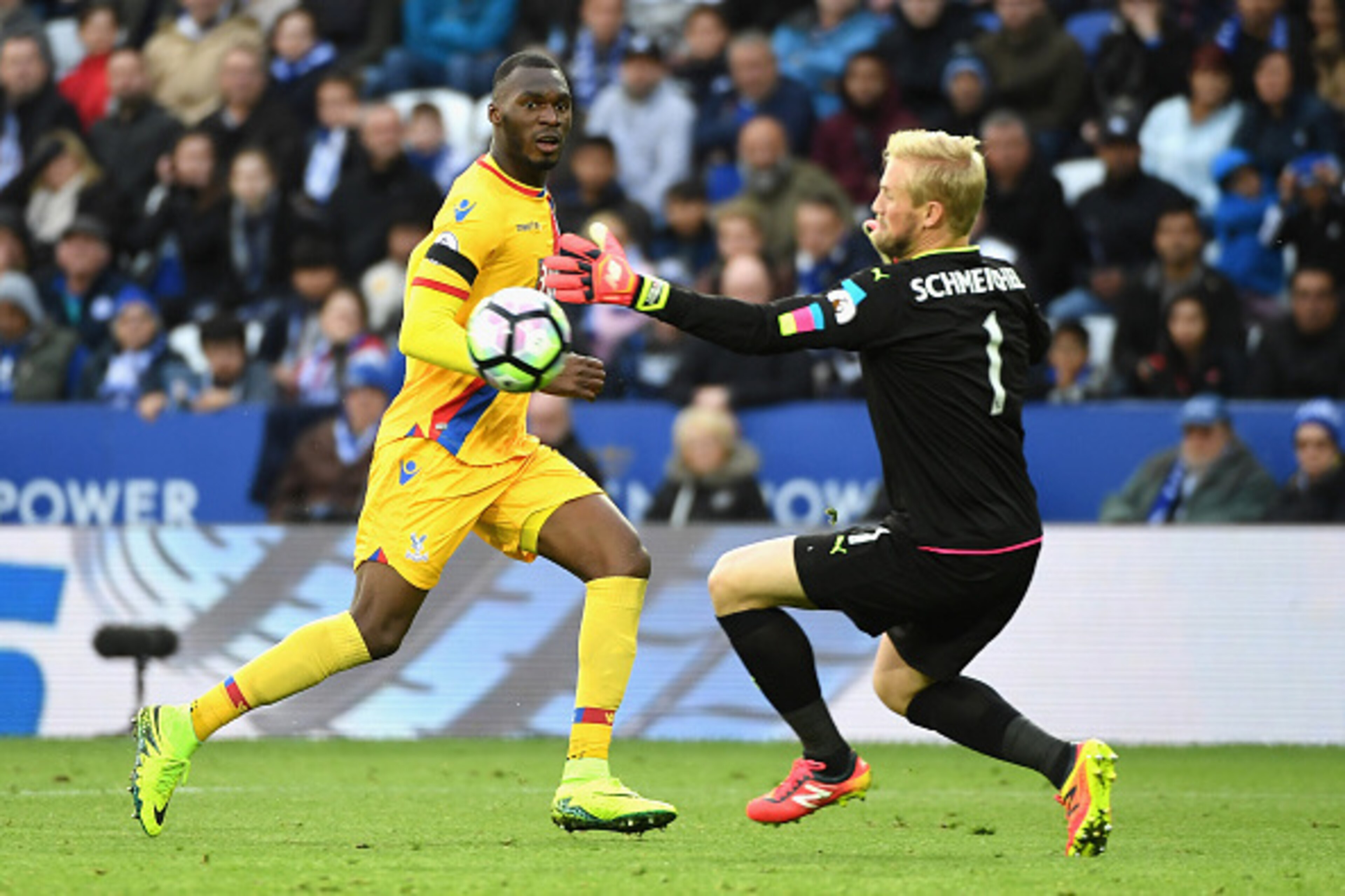 LEICESTER, ENGLAND - OCTOBER 22: Kasper Schmeichel of Leicester City makes a save a shot by Christian Benteke of Crystal Palace during the Premier League match between Leicester City and Crystal Palace at The King Power Stadium on October 22, 2016 in Leic