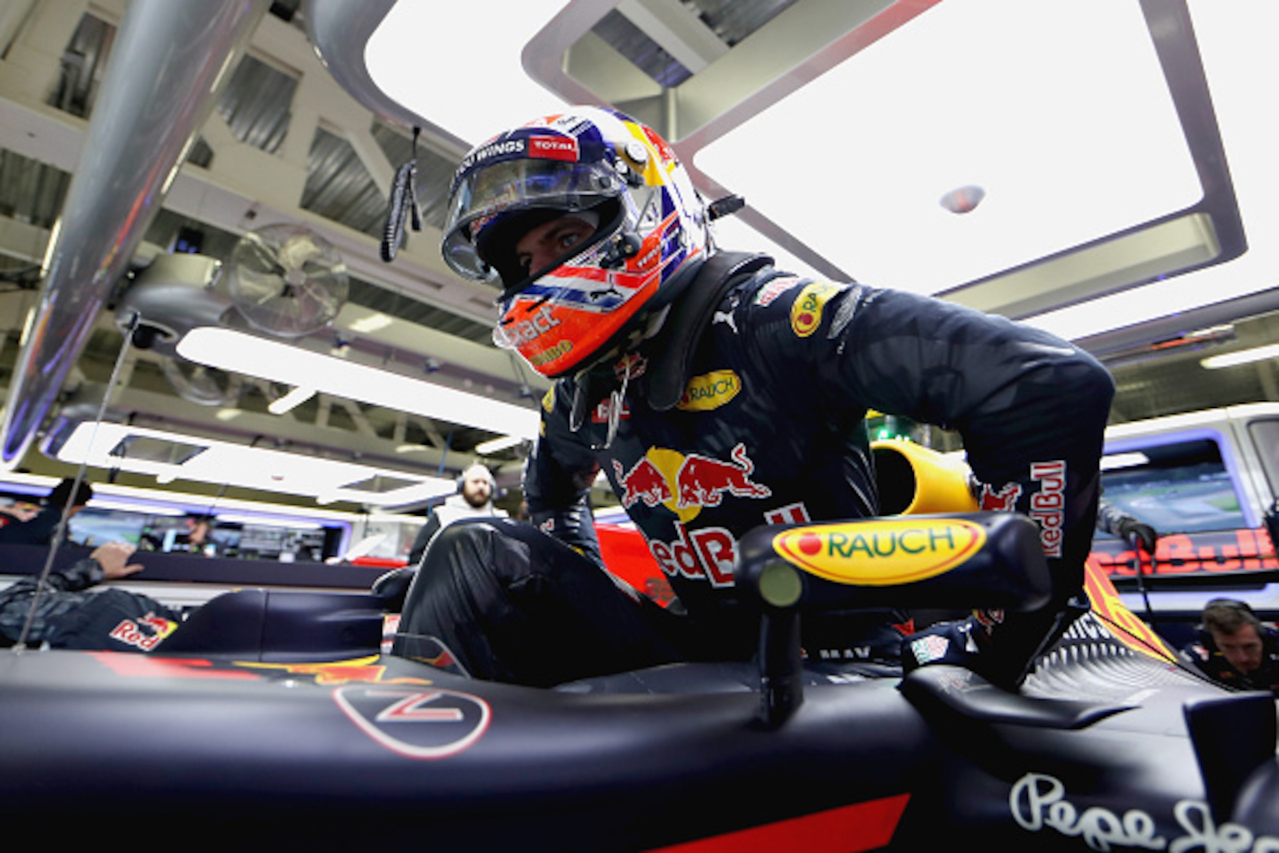 MEXICO CITY, MEXICO - OCTOBER 28:  Max Verstappen of Netherlands and Red Bull Racing climbs into his car in the garage during practice for the Formula One Grand Prix of Mexico at Autodromo Hermanos Rodriguez on October 28, 2016 in Mexico City, Mexico.  (P