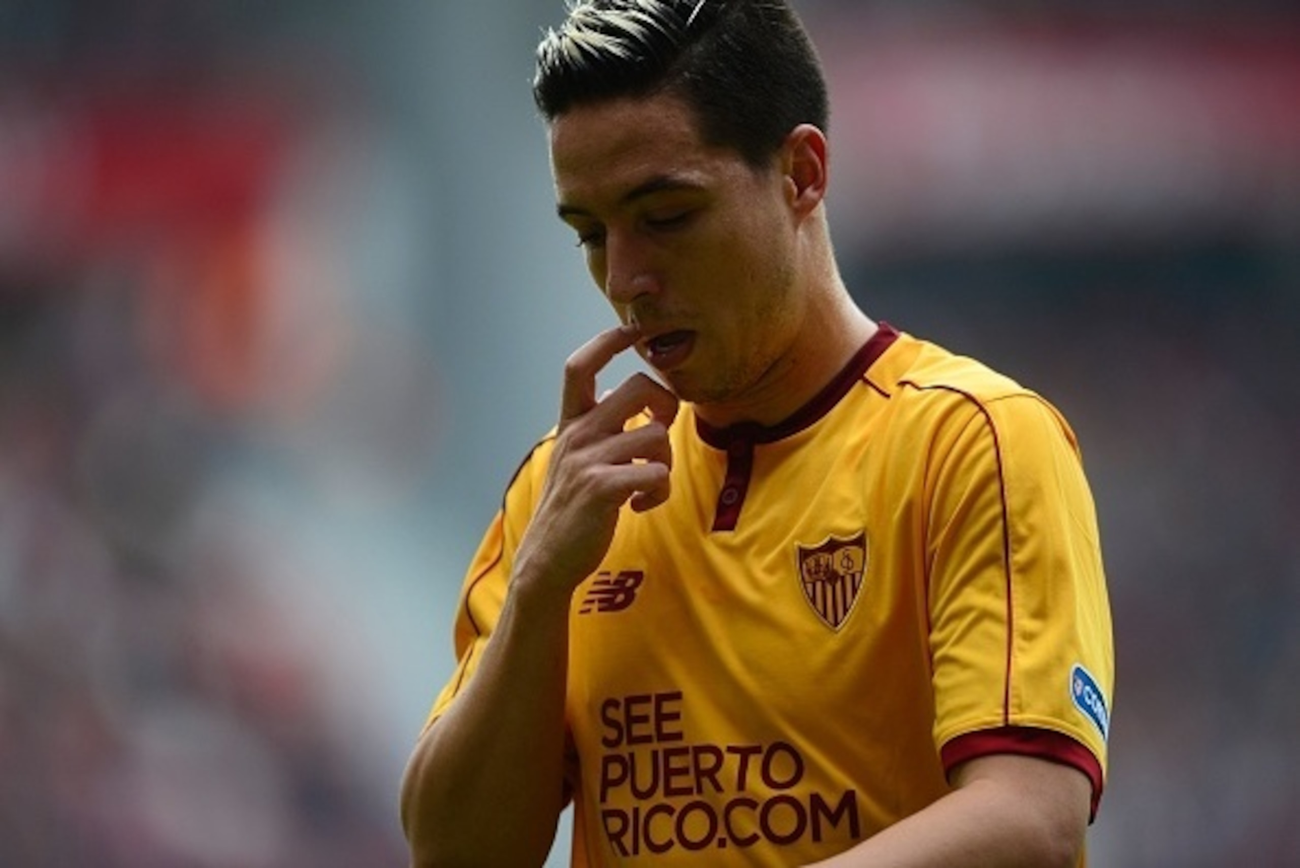 Sevilla's French forward Samir Nasri gestures during the Spanish league football match between Real Sporting de Gijon and Sevilla FC at El Molinon stadium in Gijon on October 29, 2016. / AFP / MIGUEL RIOPA        (Photo credit should read MIGUEL RIOPA/AFP