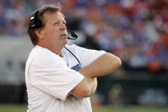 Oct 29, 2016; Jacksonville, FL, USA; Florida Gators head coach Jim McElwain looks on against the Georgia Bulldogs during the second half at EverBank Field. Florida Gators defeated the Georgia Bulldogs 24-10. Mandatory Credit: Kim Klement-USA TODAY Sports