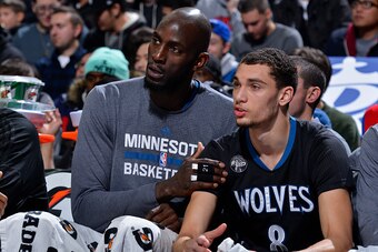 PHILADELPHIA - JANUARY 04:  Kevin Garnett #21 and Zach LaVine #8 of the Minnesota Timberwolves talk on the bench during the game against the Philadelphia 76ers at the Wells Fargo Center on January 4, 2016 in Philadelphia, Pennsylvania. NOTE TO USER: User 