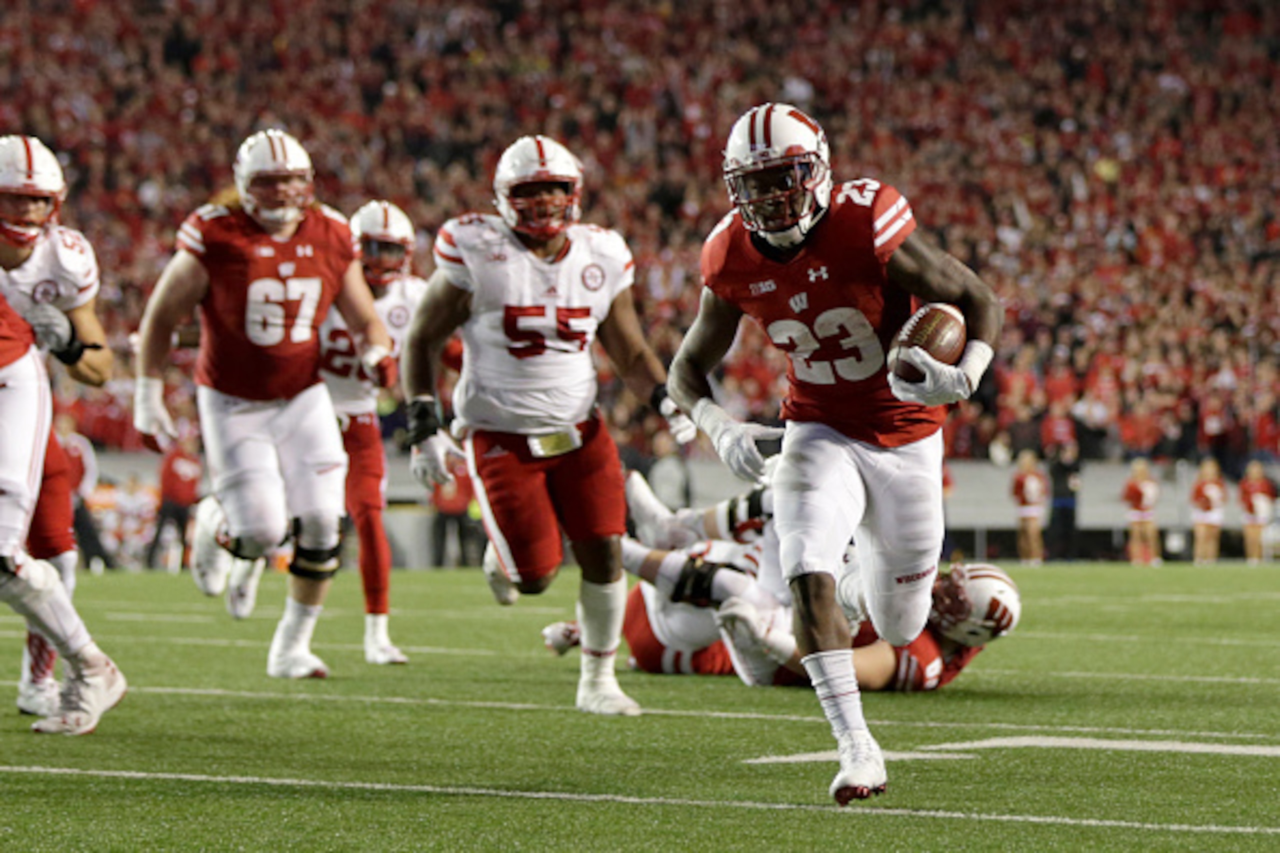 MADISON, WI - OCTOBER 29: Dare Ogunbowale #23 of the Wisconsin Badgers runs in for a touchdown overtime against the Nebraska Cornhuskers at Camp Randall Stadium on October 29, 2016 in Madison, Wisconsin. (Photo by Mike McGinnis/Getty Images)