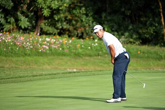 SHANGHAI, CHINA - OCTOBER 30:  Hideki Matsuyama of Japan reacts on the 17th green during day four of the WGC - HSBC Champions at Sheshan International Golf Club on October 30, 2016 in Shanghai, China.  (Photo by Ross Kinnaird/Getty Images)