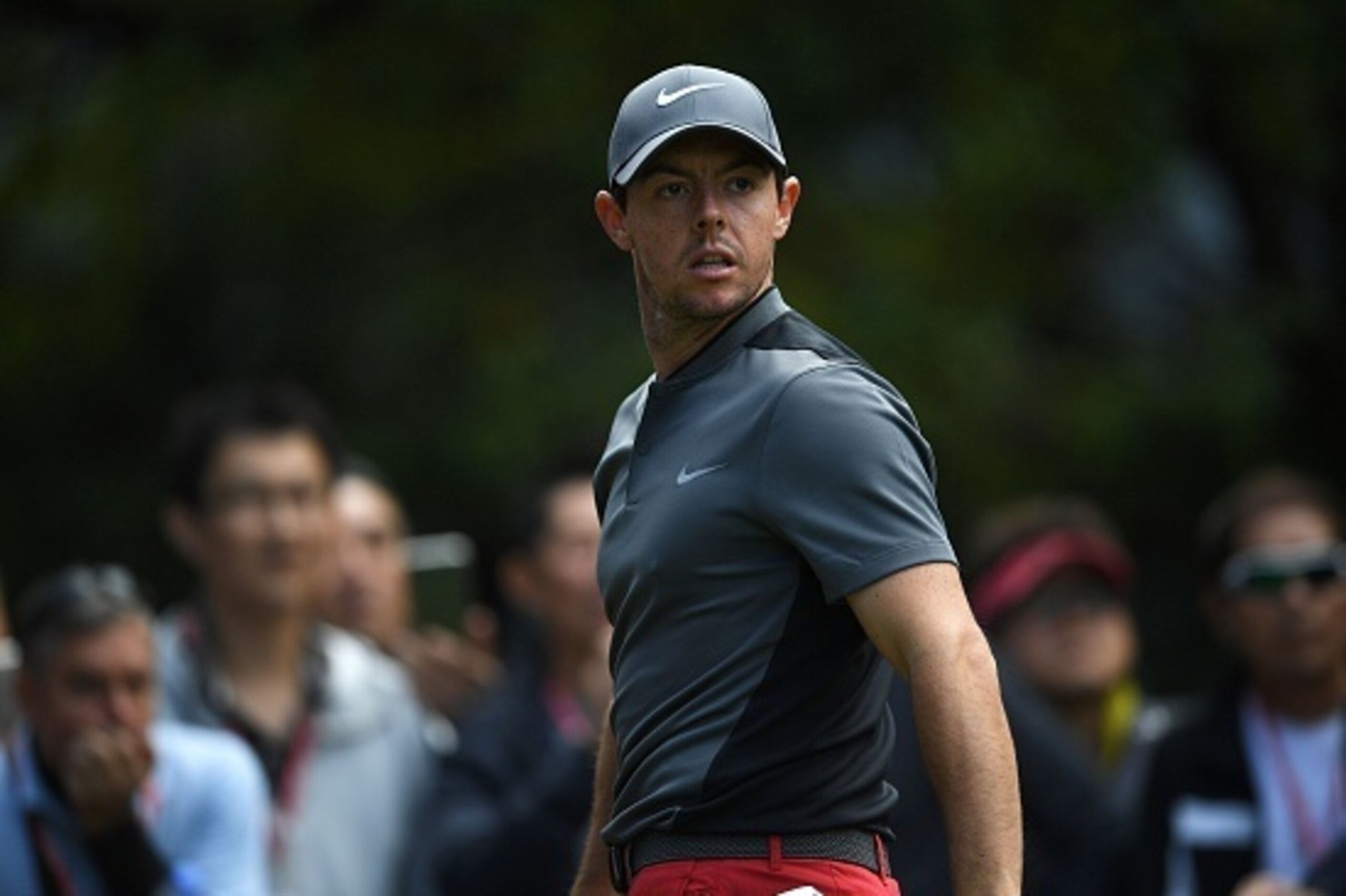 Rory McIlroy of Northern Ireland reacts during the final round of the World Golf Championships-HSBC Champions golf tournament in Shanghai on October 30, 2016. / AFP / JOHANNES EISELE        (Photo credit should read JOHANNES EISELE/AFP/Getty Images)