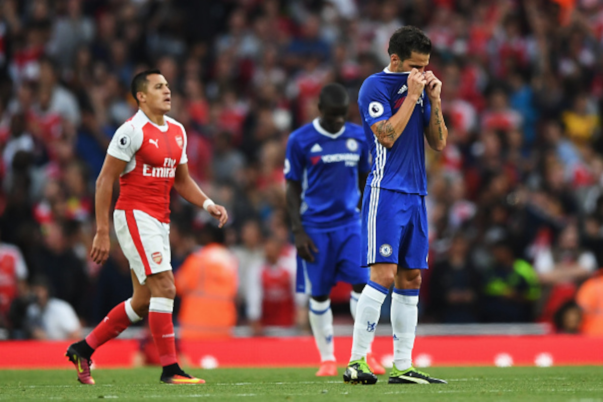 LONDON, ENGLAND - SEPTEMBER 24: Cesc Fabregas of Chelsea shows dejection after Arsenal score during the Premier League match between Arsenal and Chelsea at the Emirates Stadium on September 24, 2016 in London, England. (Photo by Shaun Botterill/Getty Im LONDON, ENGLAND - SEPTEMBER 24: Cesc Fabregas of Chelsea shows dejection after Arsenal score during the Premier League match between Arsenal and Chelsea at the Emirates Stadium on September 24, 2016 in London, England. (Photo by Shaun Botterill/Getty Im