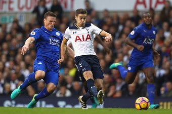 LONDON, ENGLAND - OCTOBER 29: Harry Winks of Tottenham Hotspur (C) shoots during the Premier League match between Tottenham Hotspur and Leicester City at White Hart Lane on October 29, 2016 in London, England.  (Photo by Clive Rose/Getty Images)