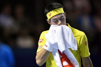 Japan's Kei Nishikori wipes his face during his final match against Croatia's Marin Cilic at the Swiss Indoors ATP 500 tennis tournament on October 30, 2016 in Basel. / AFP / FABRICE COFFRINI        (Photo credit should read FABRICE COFFRINI/AFP/Getty Ima