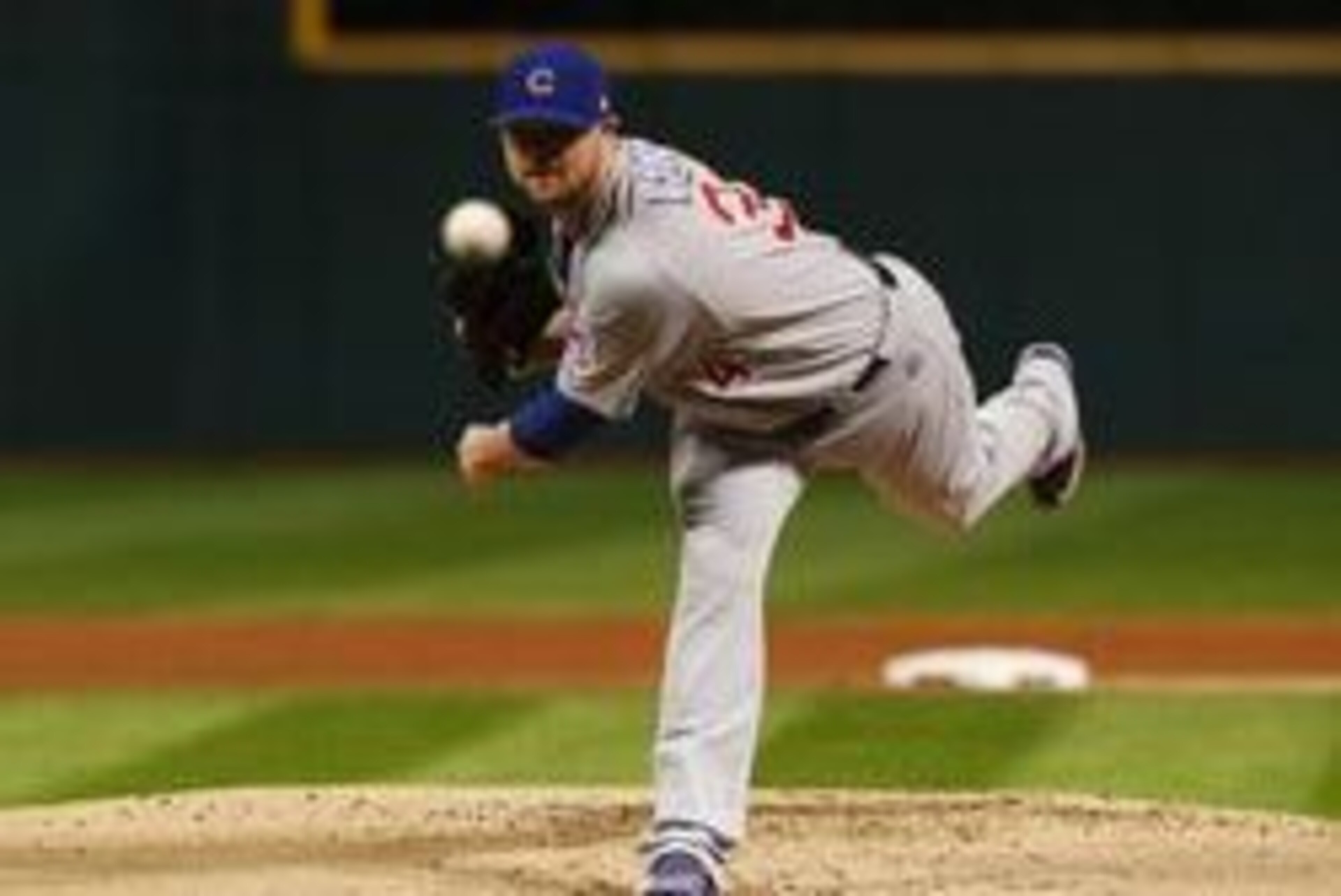 Oct 25, 2016; Cleveland, OH, USA; Chicago Cubs starting pitcher Jon Lester throws a pitch against the Cleveland Indians in the first inning in game one of the 2016 World Series at Progressive Field. Mandatory Credit: Elsa/Pool Photo via USA TODAY Sports