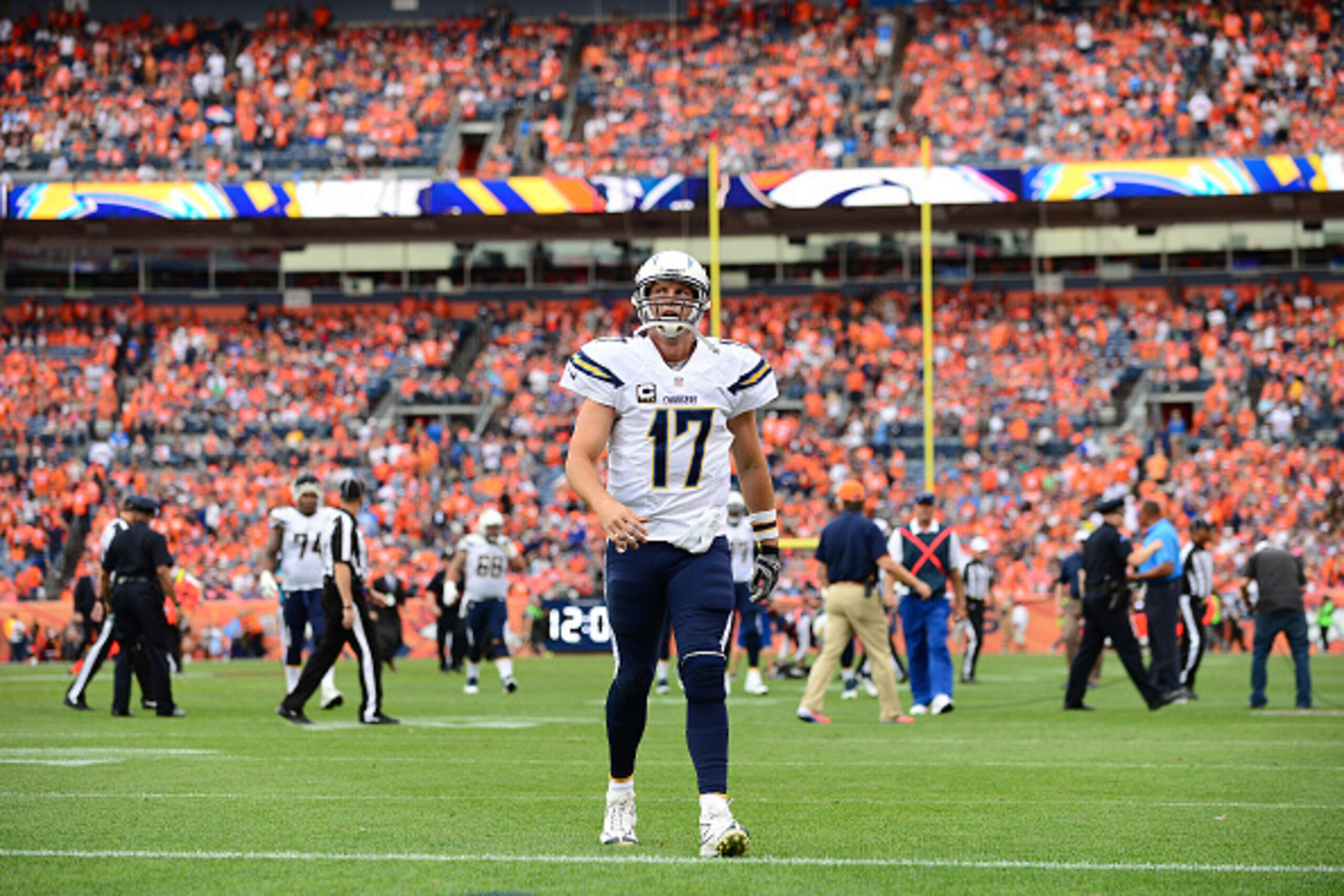 DENVER, CO - OCTOBER 30: Quarterback Philip Rivers #17 of the San Diego Chargers walks off the field after the first half of the game against the Denver Broncos at Sports Authority Field at Mile High on October 30, 2016 in Denver, Colorado. (Photo by Dus DENVER, CO - OCTOBER 30: Quarterback Philip Rivers #17 of the San Diego Chargers walks off the field after the first half of the game against the Denver Broncos at Sports Authority Field at Mile High on October 30, 2016 in Denver, Colorado. (Photo by Dus