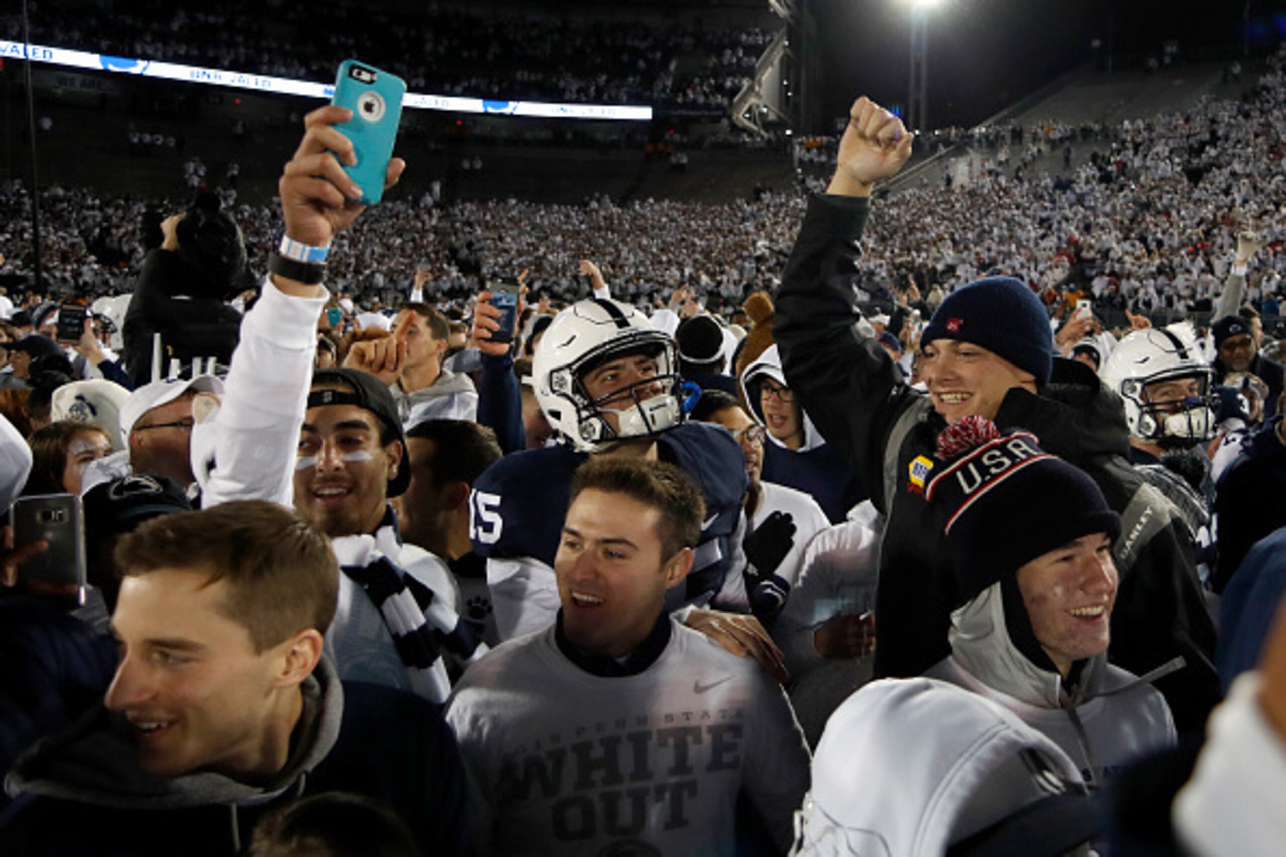 STATE COLLEGE, PA - OCTOBER 22:  Penn State students rush the field after the Penn State Nittany Lions defeated the Ohio State Buckeyes 24-21 on October 22, 2016 at Beaver Stadium in State College, Pennsylvania.  (Photo by Justin K. Aller/Getty Images)
