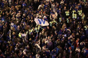 CHICAGO, IL - OCTOBER 30:  Fans celebrate outside Wrigley Field after the Chicago Cubs beat the Cleveland Indians 3-2 during Game Five of the 2016 World Series at Wrigley Field on October 30, 2016 in Chicago, Illinois.  (Photo by Scott Olson/Getty Images)