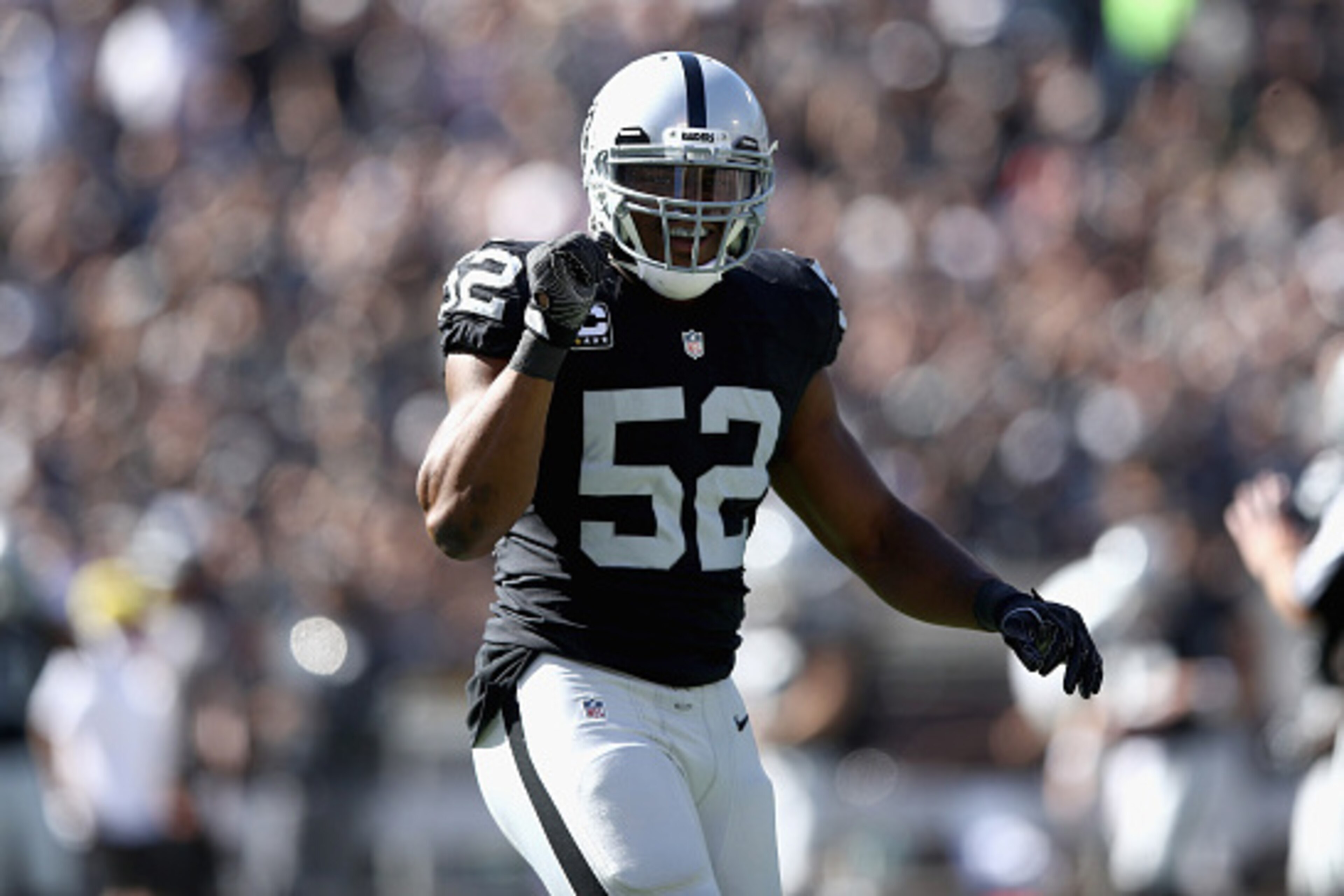 OAKLAND, CA - OCTOBER 09:  Khalil Mack #52 of the Oakland Raiders reacts during their game against the San Diego Chargers at Oakland-Alameda County Coliseum on October 9, 2016 in Oakland, California.  (Photo by Ezra Shaw/Getty Images)