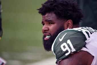 PITTSBURGH, PA - OCTOBER 09: Defensive lineman Sheldon Richardson #91 of the New York Jets looks on from the sideline during a game against the Pittsburgh Steelers at Heinz Field on October 9, 2016 in Pittsburgh, Pennsylvania. The Steelers defeated the Je