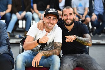 BARCELONA - OCTOBER 5: Paco Alcacer and Aleix Vidal attend the game between the Oklahoma City Thunder and FC Barcelona Lassa as part of the 2016 Global Games on October 5, 2016 at the Palau Sant Jordi, Spain. NOTE TO USER: User expressly acknowledges and 