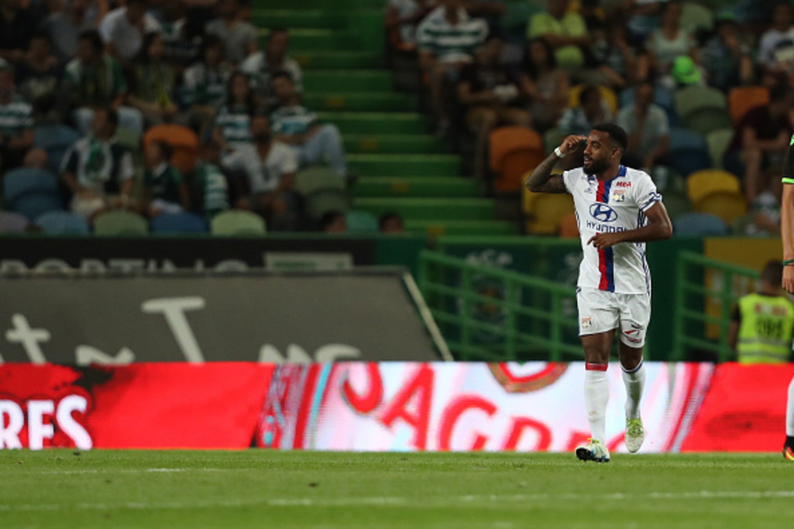 LISBON, PORTUGAL - JULY 23:  Lyon's forward Alexandre Lacazette celebrates scoring Lyon«s goal during the Friendly match between Sporting CP and Lyon at Estadio Jose Alvalade on July 23, 2016 in Lisbon, Portugal.  (Photo by Carlos Rodrigues/Getty Images)