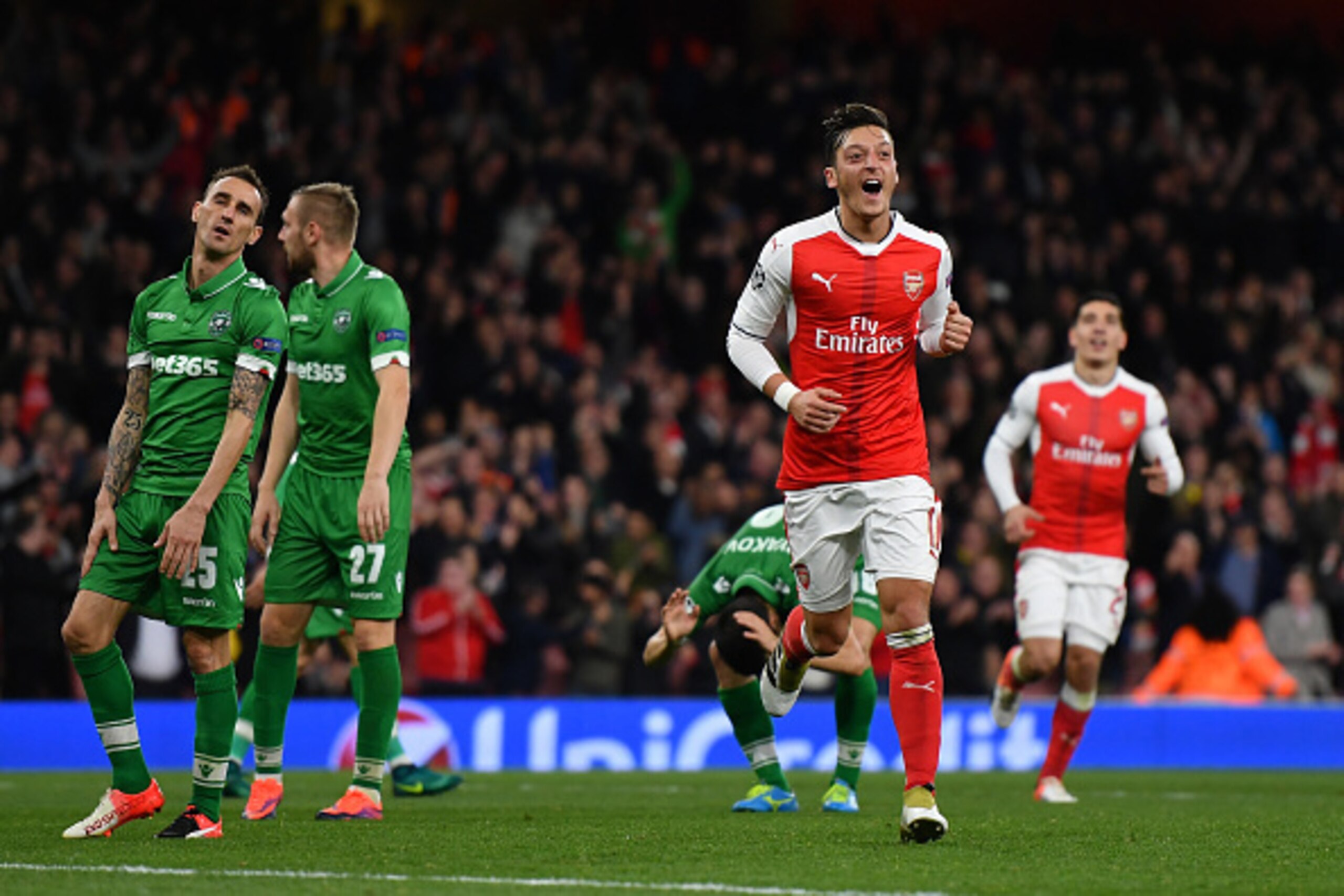 LONDON, ENGLAND - OCTOBER 19:  Mesut Ozil of Arsenal celebrates after scoring his third and his team's sixth goal of the game during the UEFA Champions League group A match between Arsenal FC and PFC Ludogorets Razgrad at the Emirates Stadium on October 1
