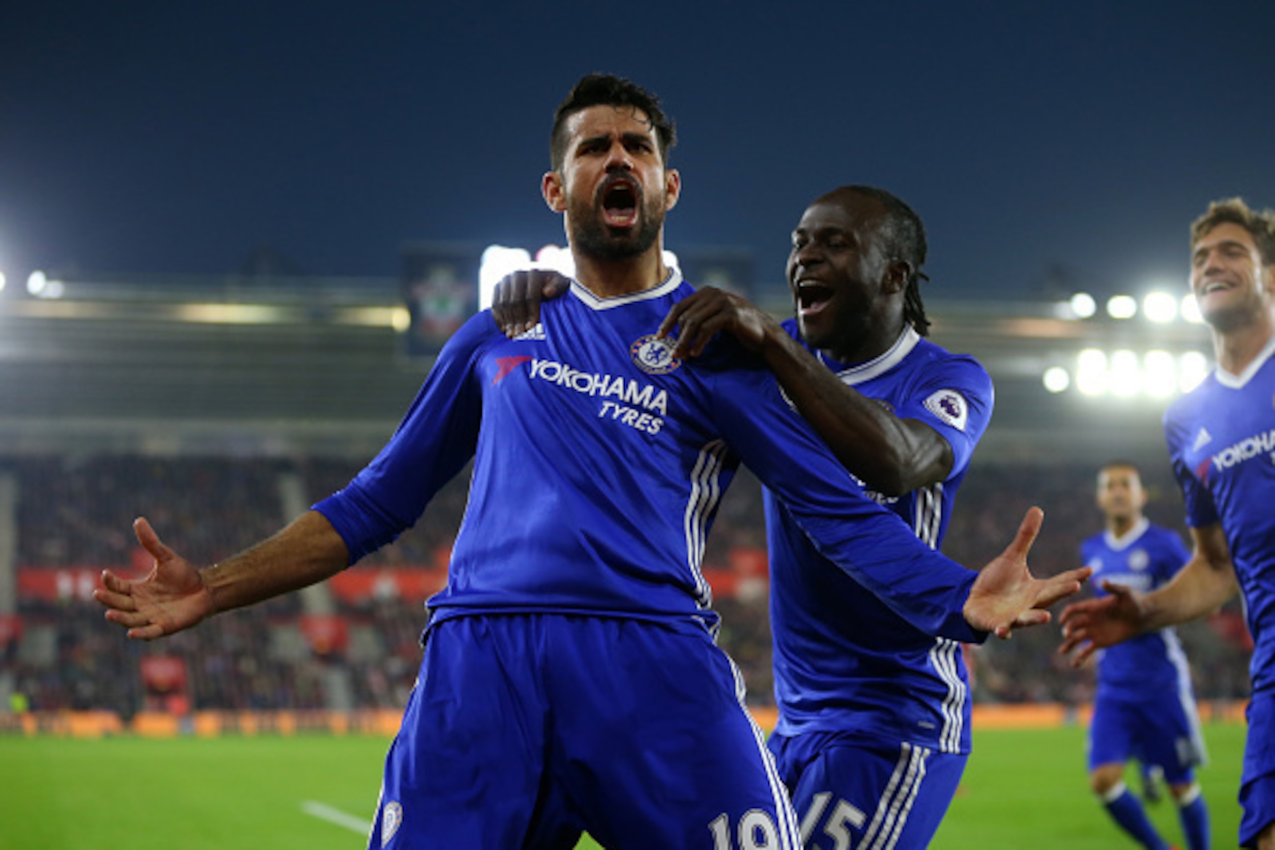 SOUTHAMPTON, ENGLAND - OCTOBER 30: Diego Costa of Chelsea celebrates after scoring to make it 0-2 with Victor Moses of Chelsea during the Premier League match between Southampton and Chelsea at St Mary's Stadium on October 30, 2016 in Southampton, England
