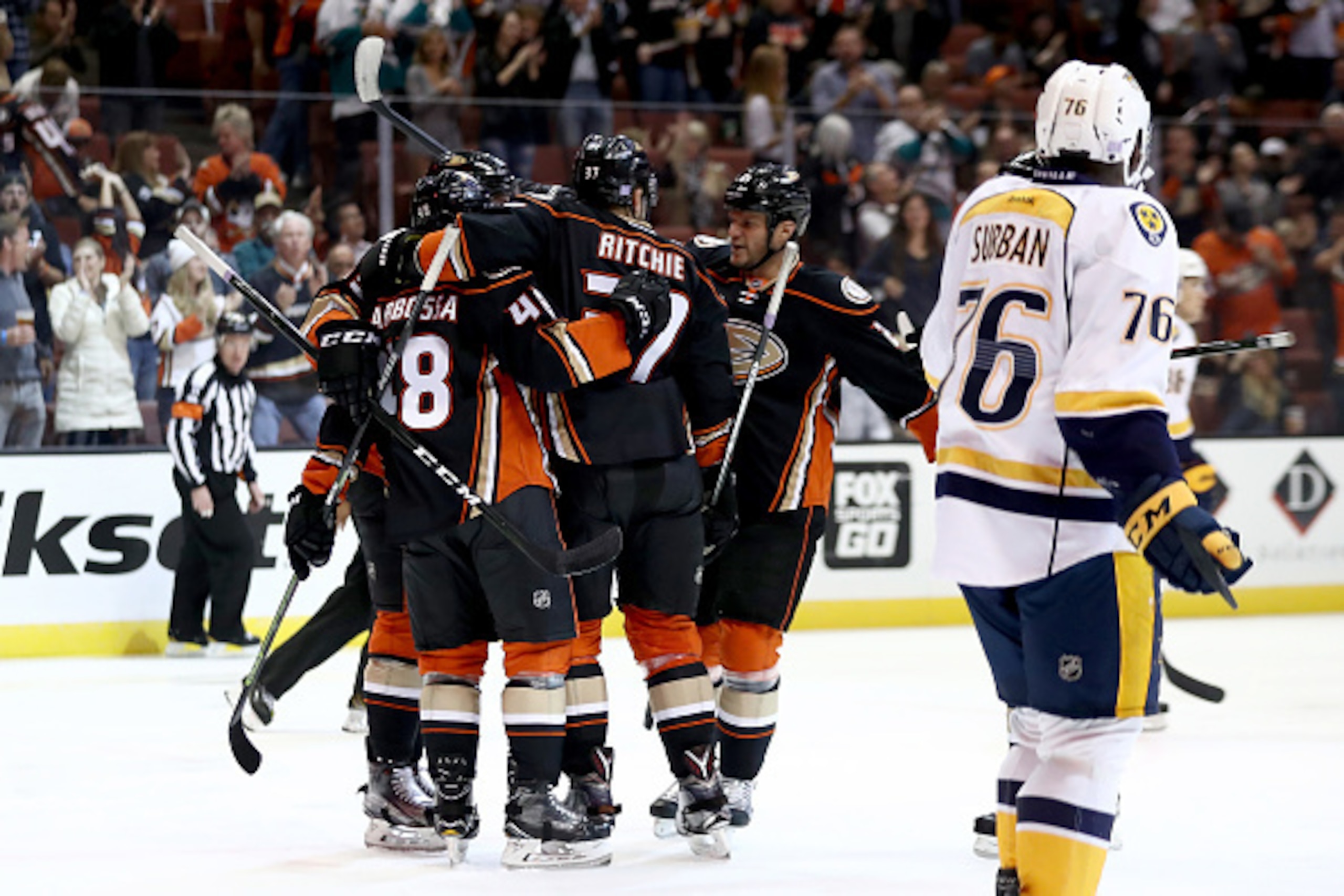 ANAHEIM, CA - OCTOBER 26:  Nick Ritchie #37 is congratulated by Michael Sgarbossa #48 and Andrew Cogliano #7 of the Anaheim Ducks after scoring a goal as P.K. Subban #76 of the Nashville Predators looks on during the first period of a game against the Nas