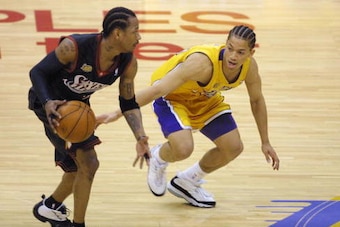 8 Jun 2001:  Tyronn Lue #10 of the Los Angeles Lakers defends Allen Iverson #3 of the Philadelphia 76ers in game two of the NBA Finals at Staples Center in Los Angeles, California.  The Lakers won 98-89.  DIGITAL IMAGE.  Mandatory Credit: Jeff Gross/Allsp