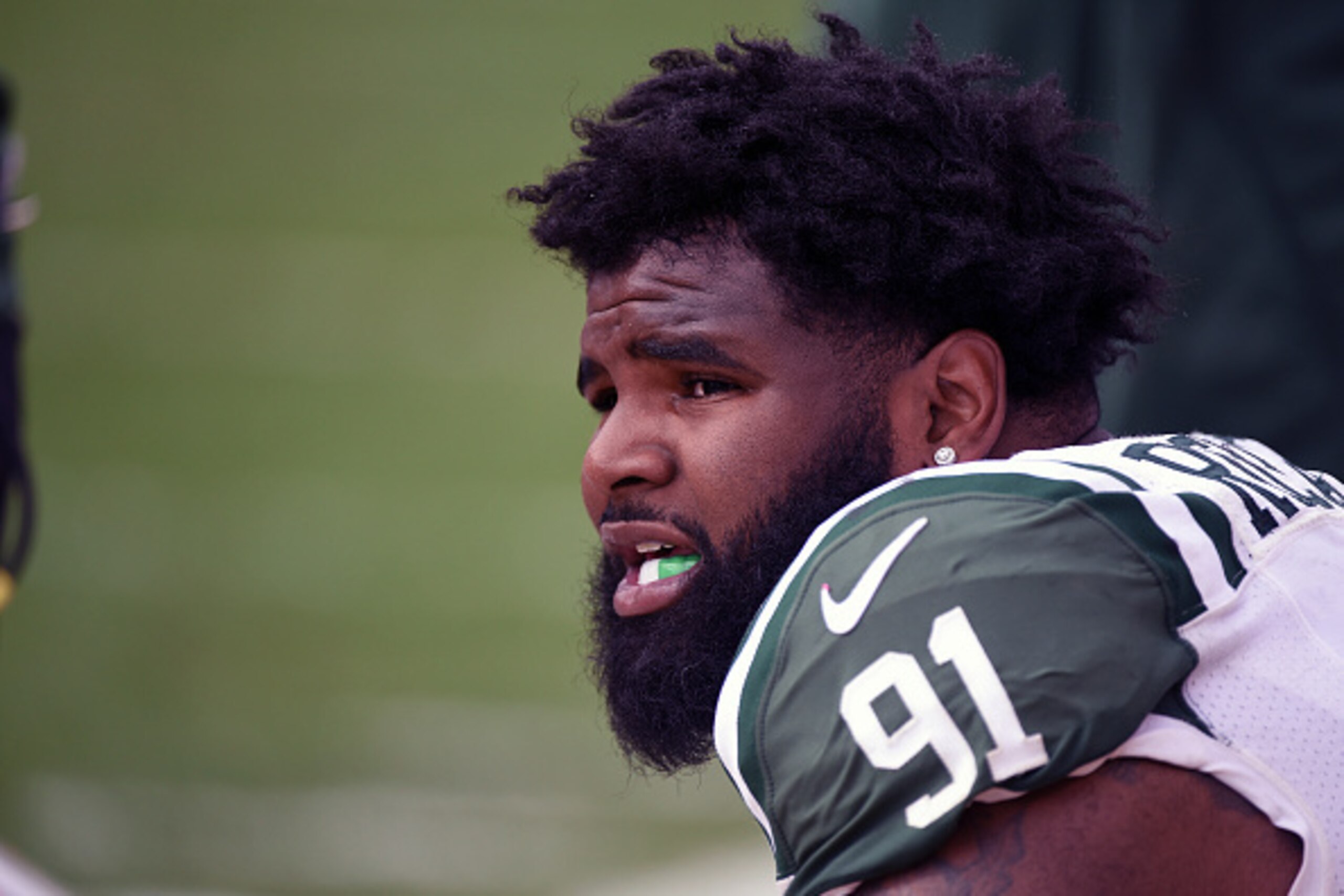 PITTSBURGH, PA - OCTOBER 09: Defensive lineman Sheldon Richardson #91 of the New York Jets looks on from the sideline during a game against the Pittsburgh Steelers at Heinz Field on October 9, 2016 in Pittsburgh, Pennsylvania. The Steelers defeated the Je