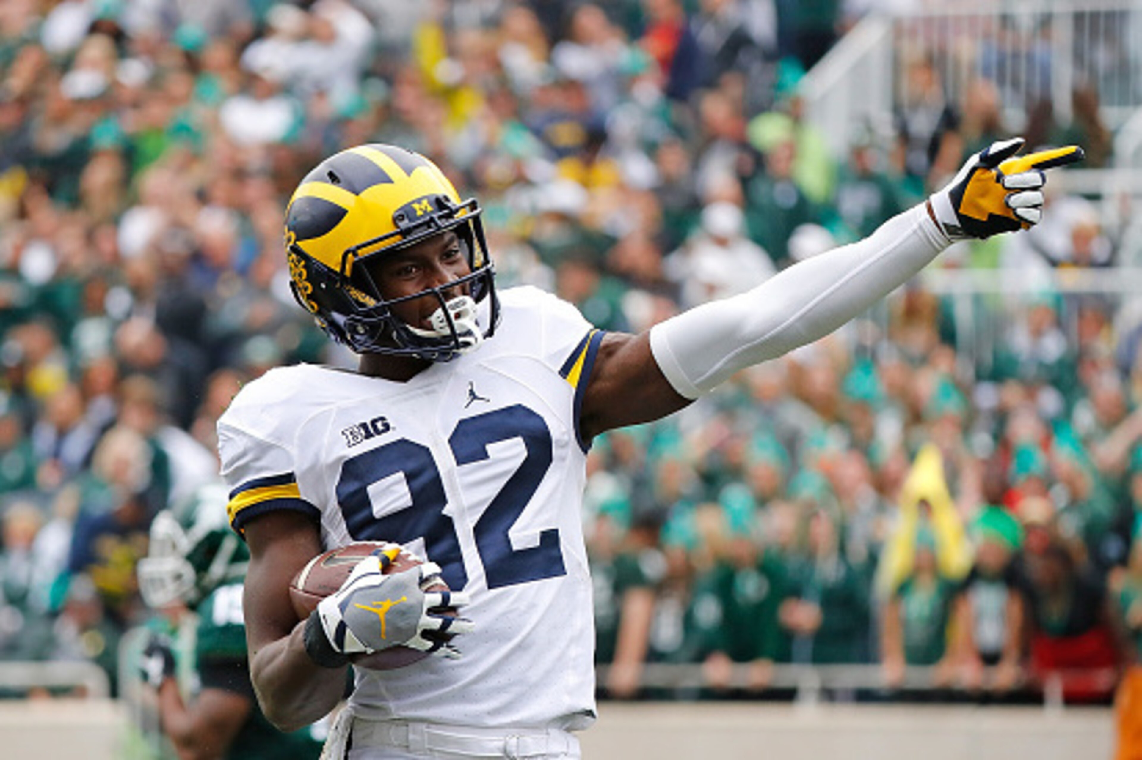 EAST LANSING, MI - OCTOBER 29: Amara Darboh #82 of the Michigan Wolverines signals a first down after making a catch during the second quarter of the game against the Michigan State Spartans at Spartan Stadium on October 29, 2016 in East Lansing, Michigan
