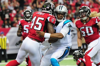 ATLANTA, GA - OCTOBER 2: Cam Newton #1 of the Carolina Panthers is hit by Deion Jones #45 of the Atlanta Falcons resulting in a concussion for Newton at the Georgia Dome on October 2, 2016 in Atlanta, Georgia. (Photo by Scott Cunningham/Getty Images)