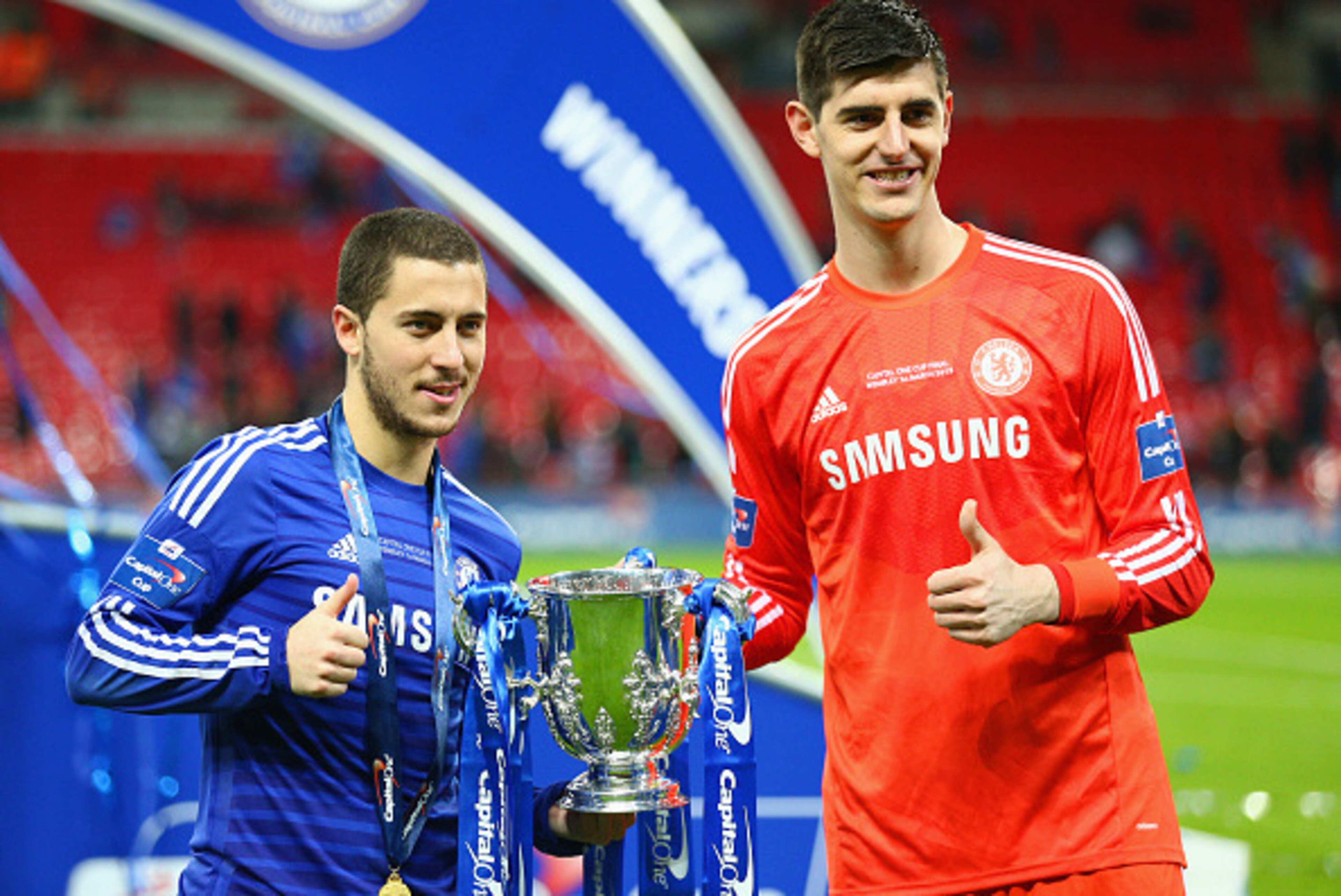 LONDON, ENGLAND - MARCH 01:  Eden Hazard and Thibaut Courtois of Chelsea pose with the trophy during the Capital One Cup Final match between Chelsea and Tottenham Hotspur at Wembley Stadium on March 1, 2015 in London, England.  (Photo by Clive Mason/Getty