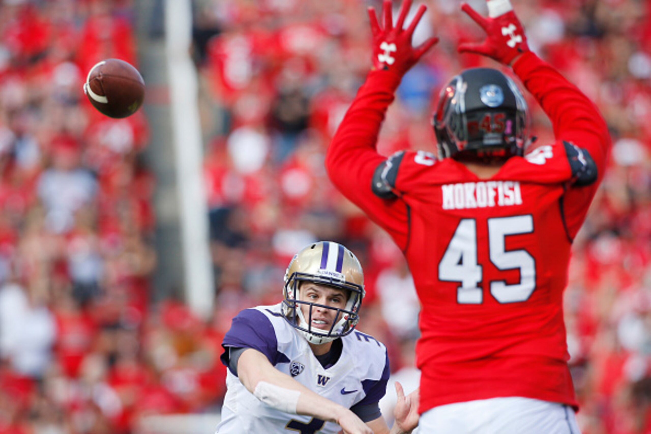 SALT LAKE CITY, UT - OCTOBER 29: Filipo Mokofisi #45 of the Utah Utes tries to block a pass of quarterback Jake Browning #3 of the Washington Huskies during the first half at Rice-Eccles Stadium on October 29, 2016 in Salt Lake City, Utah. (Photo by Georg