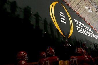 GLENDALE, AZ - JANUARY 11:  The Clemson Tigers players walk out to the field before the 2016 College Football Playoff National Championship Game against the Alabama Crimson Tide at University of Phoenix Stadium on January 11, 2016 in Glendale, Arizona.  (