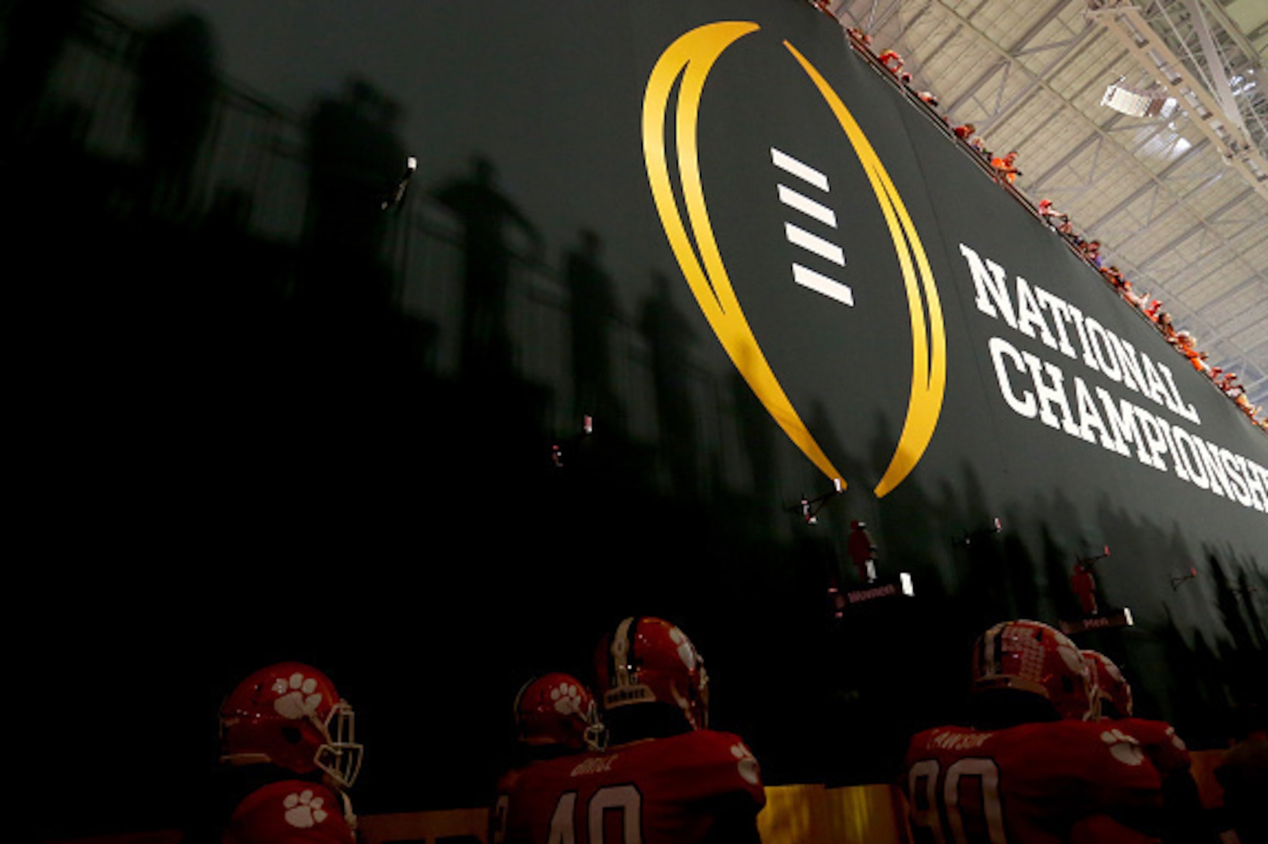 GLENDALE, AZ - JANUARY 11:  The Clemson Tigers players walk out to the field before the 2016 College Football Playoff National Championship Game against the Alabama Crimson Tide at University of Phoenix Stadium on January 11, 2016 in Glendale, Arizona.  (