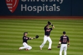 Nov 1, 2016; Cleveland, OH, USA; Cleveland Indians right fielder Lonnie Chisenhall (middle) catches a ball between second baseman Jason Kipnis (22) and center fielder Tyler Naquin (left) against the Chicago Cubs in the third inning in game six of the 2016