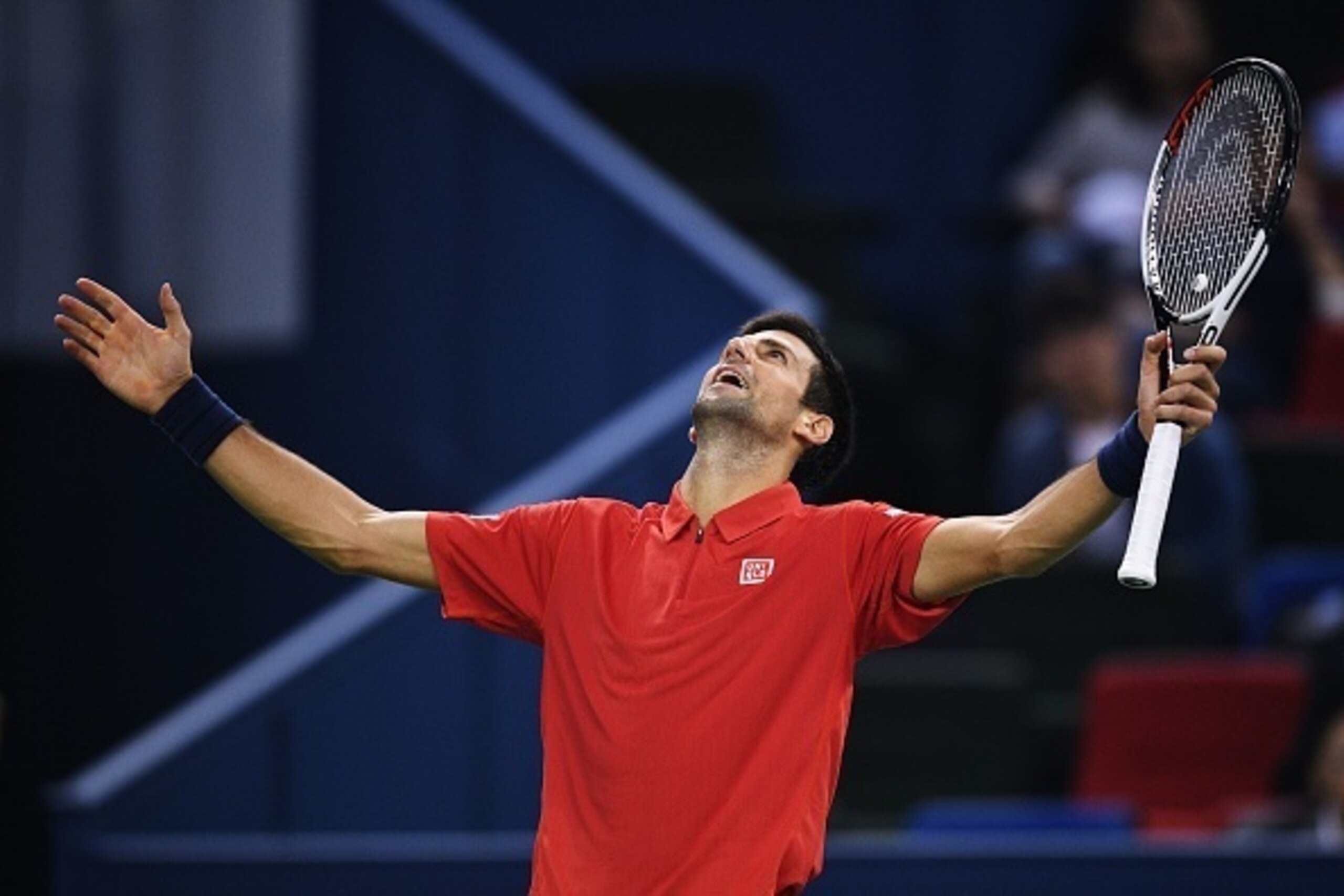 Novak Djokovic of Serbia reacts after to a point against Mischa Zverev of Germany during their men's singles match at the Shanghai Masters tennis tournament on October 14, 2016. / AFP / JOHANNES EISELE (Photo credit should read JOHANNES EISELE/AFP/ Novak Djokovic of Serbia reacts after to a point against Mischa Zverev of Germany during their men's singles match at the Shanghai Masters tennis tournament on October 14, 2016. / AFP / JOHANNES EISELE (Photo credit should read JOHANNES EISELE/AFP/