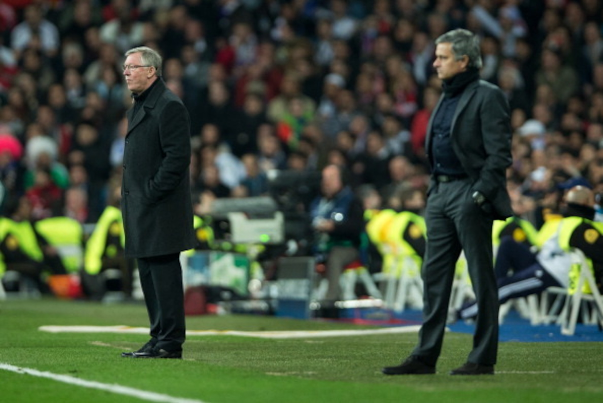 MADRID, SPAIN - FEBRUARY 13: Sir Alex Ferguson (L), manager of Manchester United, stands besides head coach Jose Mourinho of Real Madrid during the UEFA Champions League Round of 16 first leg match between Real Madrid and Manchester United at Estadio Sant MADRID, SPAIN - FEBRUARY 13: Sir Alex Ferguson (L), manager of Manchester United, stands besides head coach Jose Mourinho of Real Madrid during the UEFA Champions League Round of 16 first leg match between Real Madrid and Manchester United at Estadio Sant