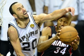 Manu Ginobili of the San Antonio Spurs vies for the ball with Ray Allen of the Miami Heat during game 5 of the NBA finals on June 16, 2013 in San Antonio, Texas., where the Spurs defeated the Heat 114-104 and now lead the series 3-2. AFP PHOTO/Frederic J.
