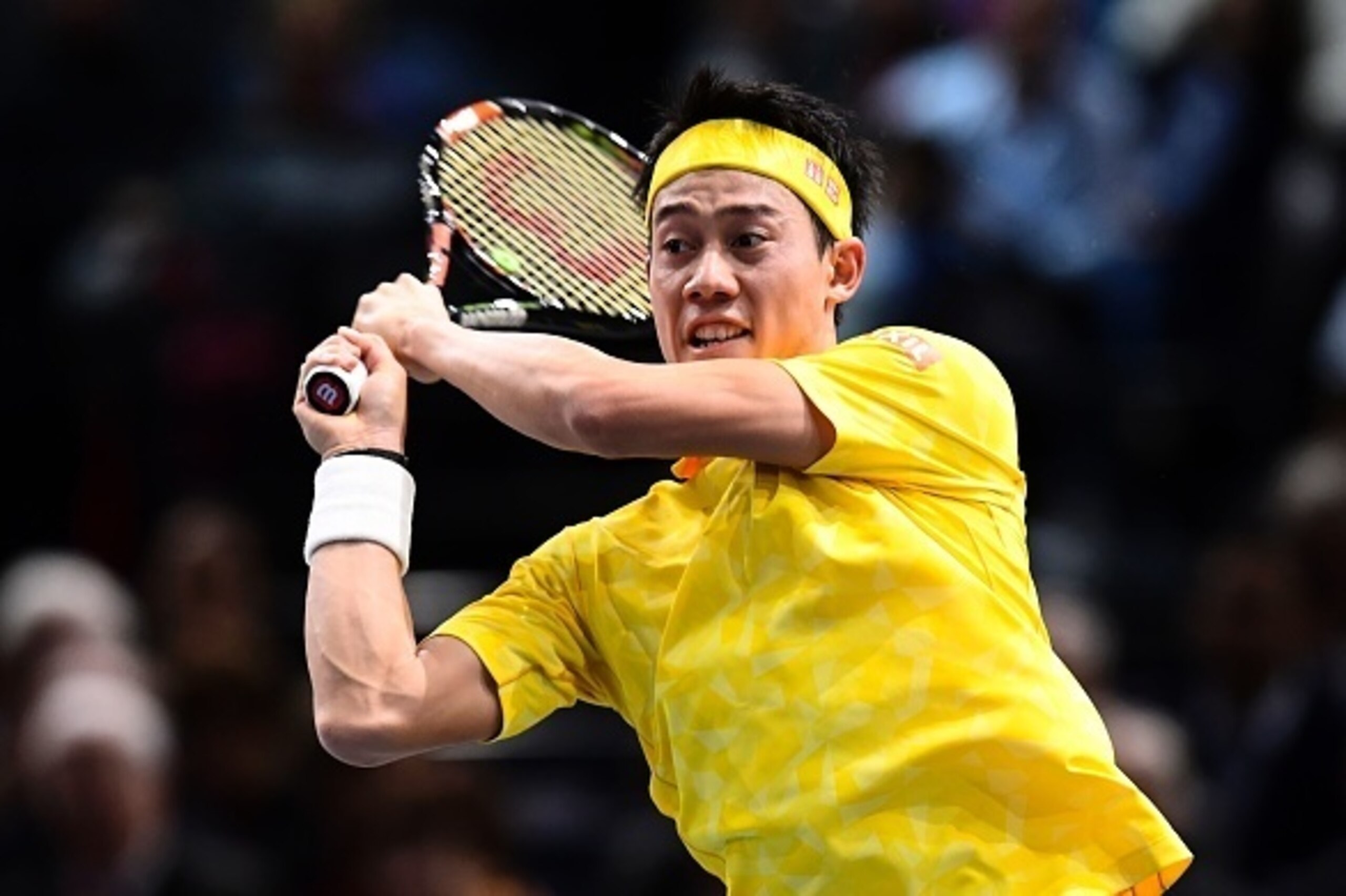 Japan's Kei Nishikori returns the ball to Serbia's Viktor Troicki during their second round tennis match at the ATP World Tour Masters 1000 indoor tournament in Paris on November 2, 2016. / AFP / MIGUEL MEDINA (Photo credit should read MIGUEL MEDIN Japan's Kei Nishikori returns the ball to Serbia's Viktor Troicki during their second round tennis match at the ATP World Tour Masters 1000 indoor tournament in Paris on November 2, 2016. / AFP / MIGUEL MEDINA (Photo credit should read MIGUEL MEDIN