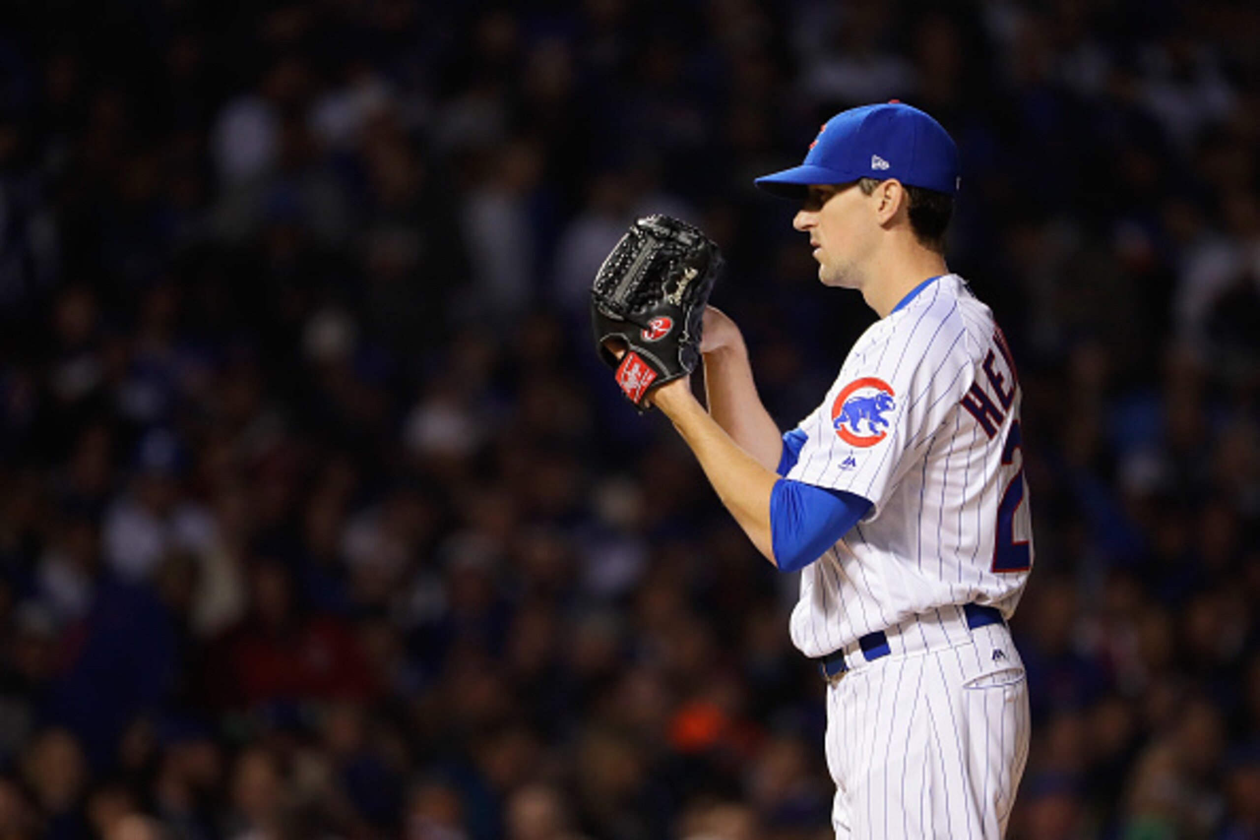 CHICAGO, IL - OCTOBER 28:  Kyle Hendricks #28 of the Chicago Cubs pitches in the first inning against the Cleveland Indians in Game Three of the 2016 World Series at Wrigley Field on October 28, 2016 in Chicago, Illinois.  (Photo by Jamie Squire/Getty Ima