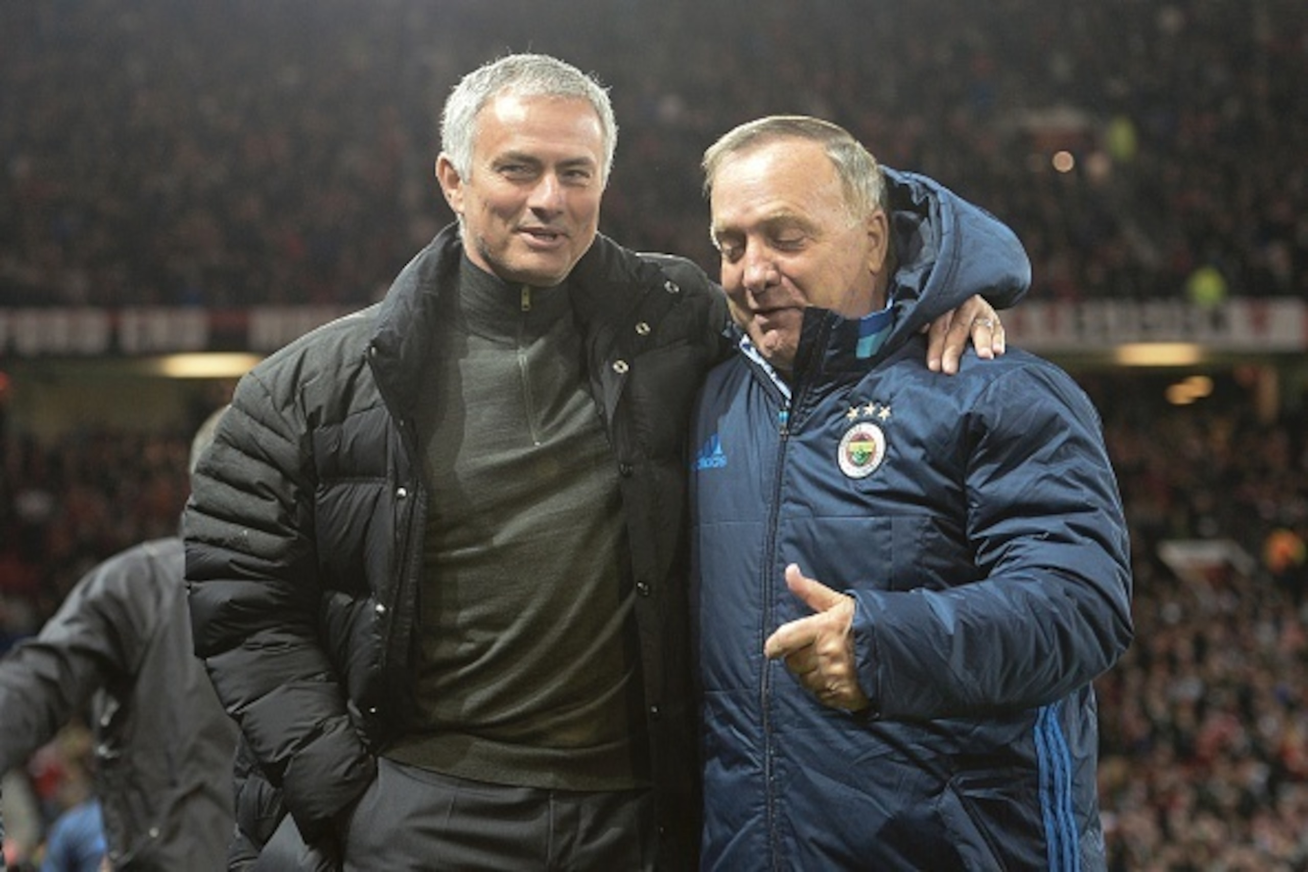 Manchester United's Portuguese manager Jose Mourinho (L) greets Fenerbahce's Dutch coach Dick Advocaat (R) during the UEFA Europa League group A football match between Manchester United and Fenerbahce at Old Trafford in Manchester, north west England, on 