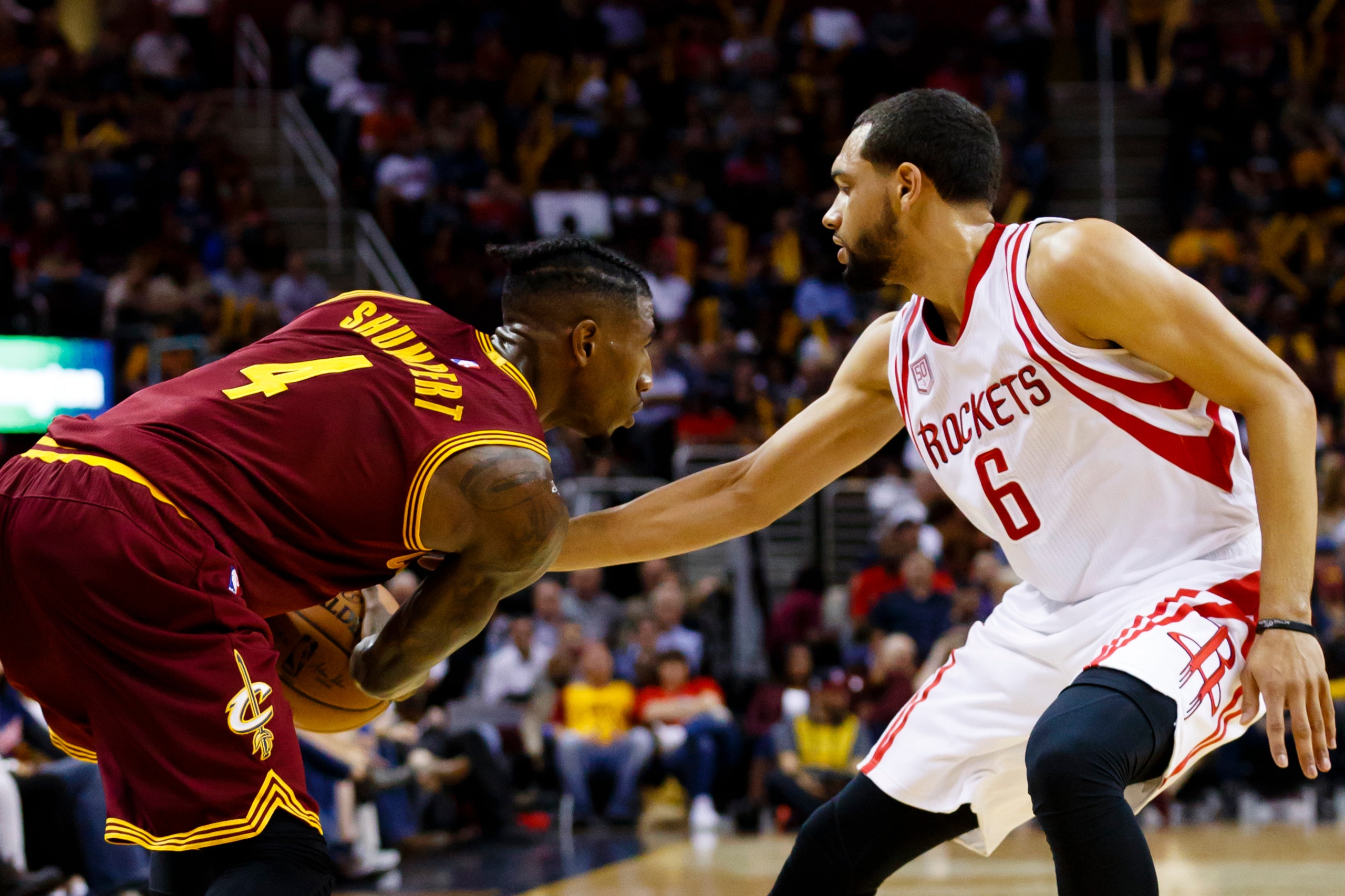 Nov 1, 2016; Cleveland, OH, USA; Cleveland Cavaliers guard Iman Shumpert (4) defended by Houston Rockets guard Tyler Ennis (6) in the second half at Quicken Loans Arena. Cleveland won 128-120. Mandatory Credit: Rick Osentoski-USA TODAY Sports