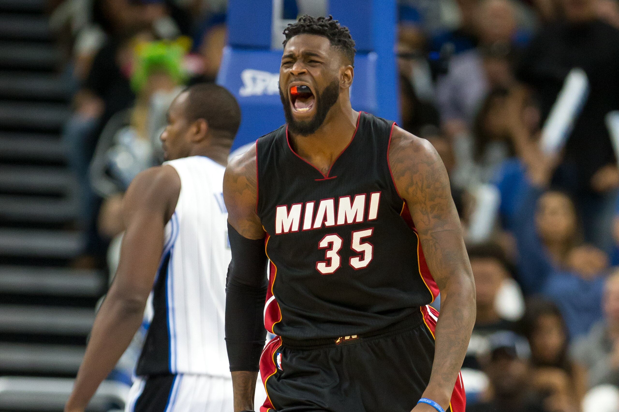 ORLANDO, FL - OCTOBER 26: Willie Reed #35 of the Miami Heat reacts to a basket against the Orlando Magic on opening night on October 26, 2016 at Amway Center in Orlando, Florida. NOTE TO USER: User expressly acknowledges and agrees that, by downloading an