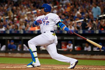 NEW YORK, NY - SEPTEMBER 03: Yoenis Cespedes #52 in action against the Washington Nationals during of a game at Citi Field on September 3, 2016 in the Flushing neighborhood of the Queens borough of New York City. The Mets defeated the Nationals 3-1. (Phot
