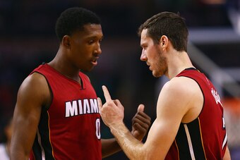 BOSTON, MA - FEBRUARY 27:  Goran Dragic #7 of the Miami Heat talks with Josh Richardson #0 during the third quarter against the Boston Celtics  at TD Garden on February 27, 2016 in Boston, Massachusetts.  (Photo by Maddie Meyer/Getty Images)