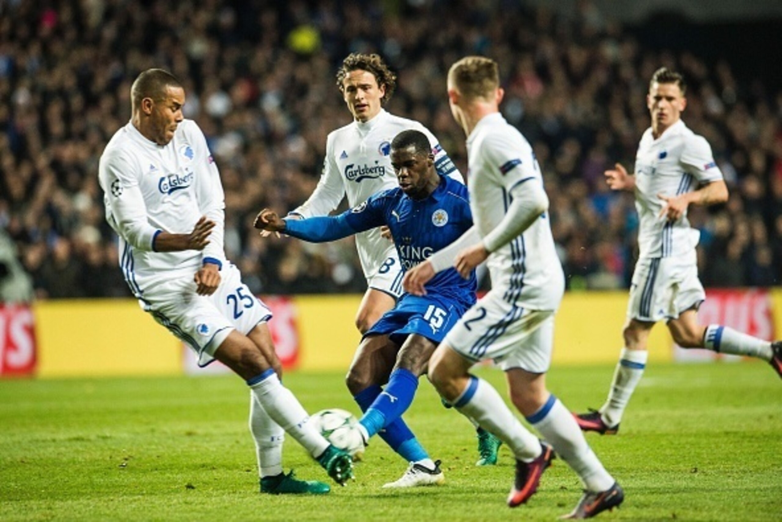 Leicester City FC Jeff Schlupp attempts a shot which is blocked by FCK Mathias Zanka Joergensen during the UEFA Champions League group G football match between FC Copenhagen and Leicester City FC at the Telia Parken stadium in Copenhagen on November 2, 20 Leicester City FC Jeff Schlupp attempts a shot which is blocked by FCK Mathias Zanka Joergensen during the UEFA Champions League group G football match between FC Copenhagen and Leicester City FC at the Telia Parken stadium in Copenhagen on November 2, 20