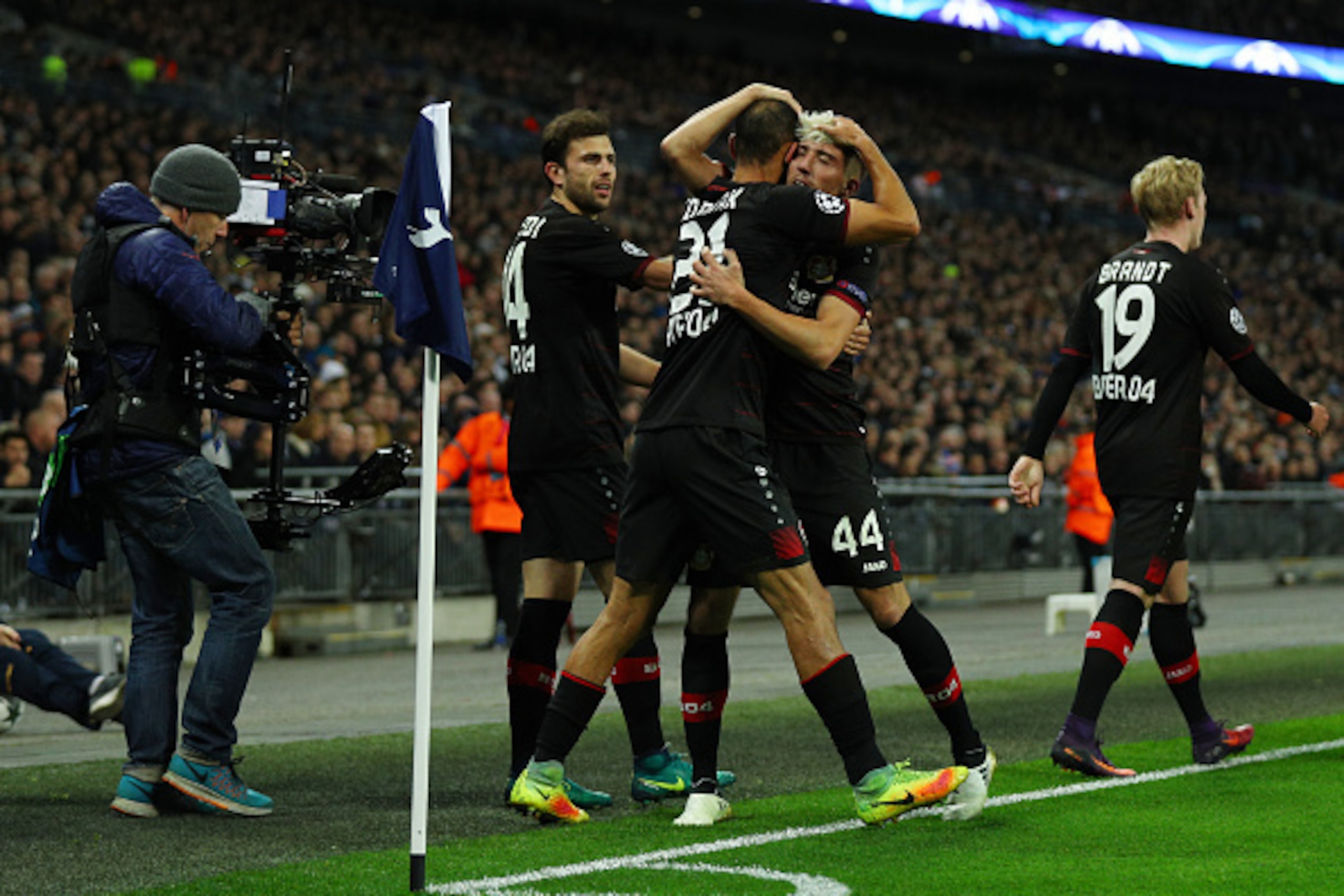 LONDON, ENGLAND - NOVEMBER 02: Kevin Kampl of Bayer Leverkusen celebrates scoring his sides first goal with team mates during the UEFA Champions League Group E match between Tottenham Hotspur FC and Bayer 04 Leverkusen at Wembley Stadium on November 2, 20