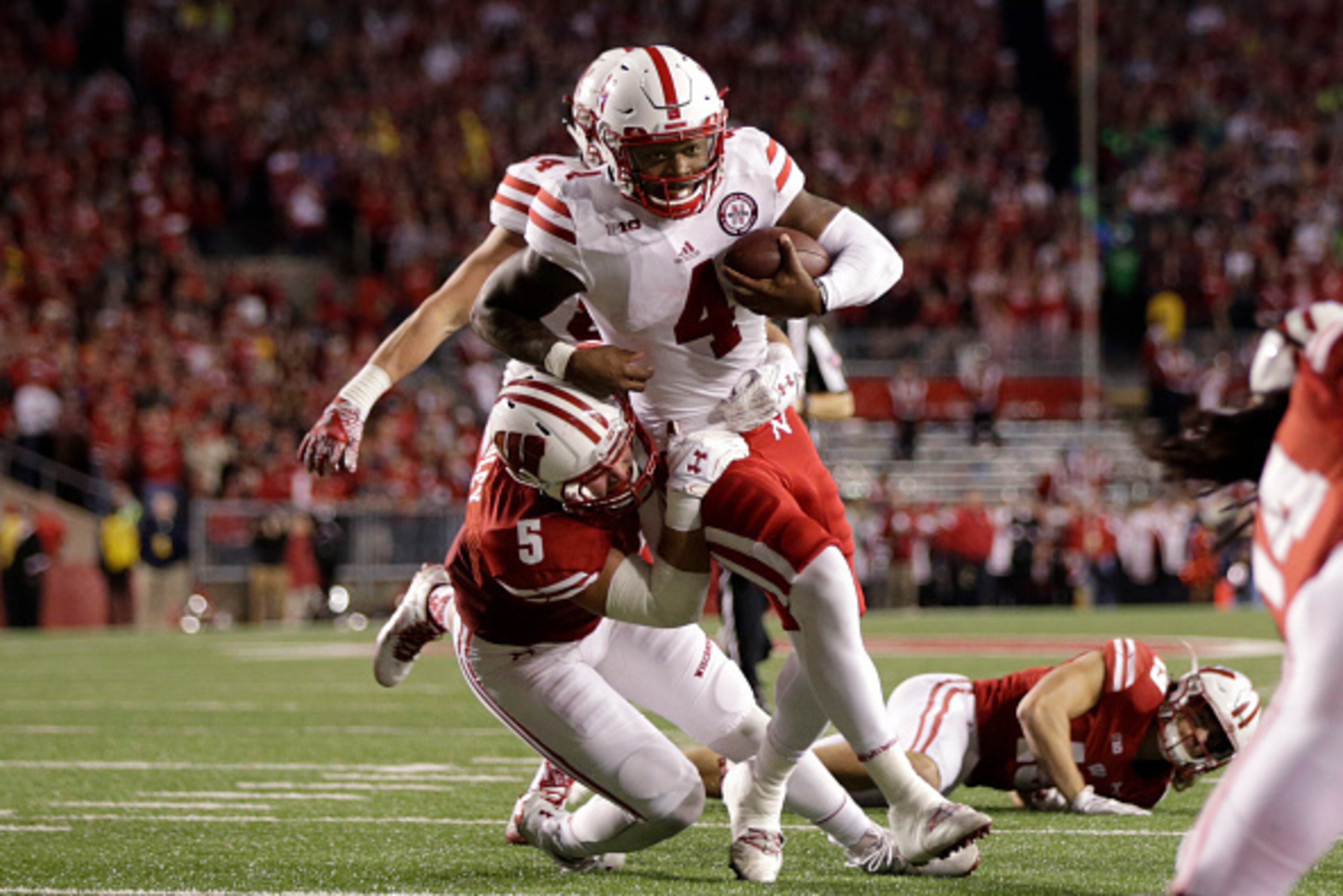 MADISON, WI - OCTOBER 29: Tommy Armstrong Jr. #4 of the Nebraska Cornhuskers runs with the football during the fourth quarter against the Wisconsin Badgers at Camp Randall Stadium on October 29, 2016 in Madison, Wisconsin. (Photo by Mike McGinnis/Getty Im