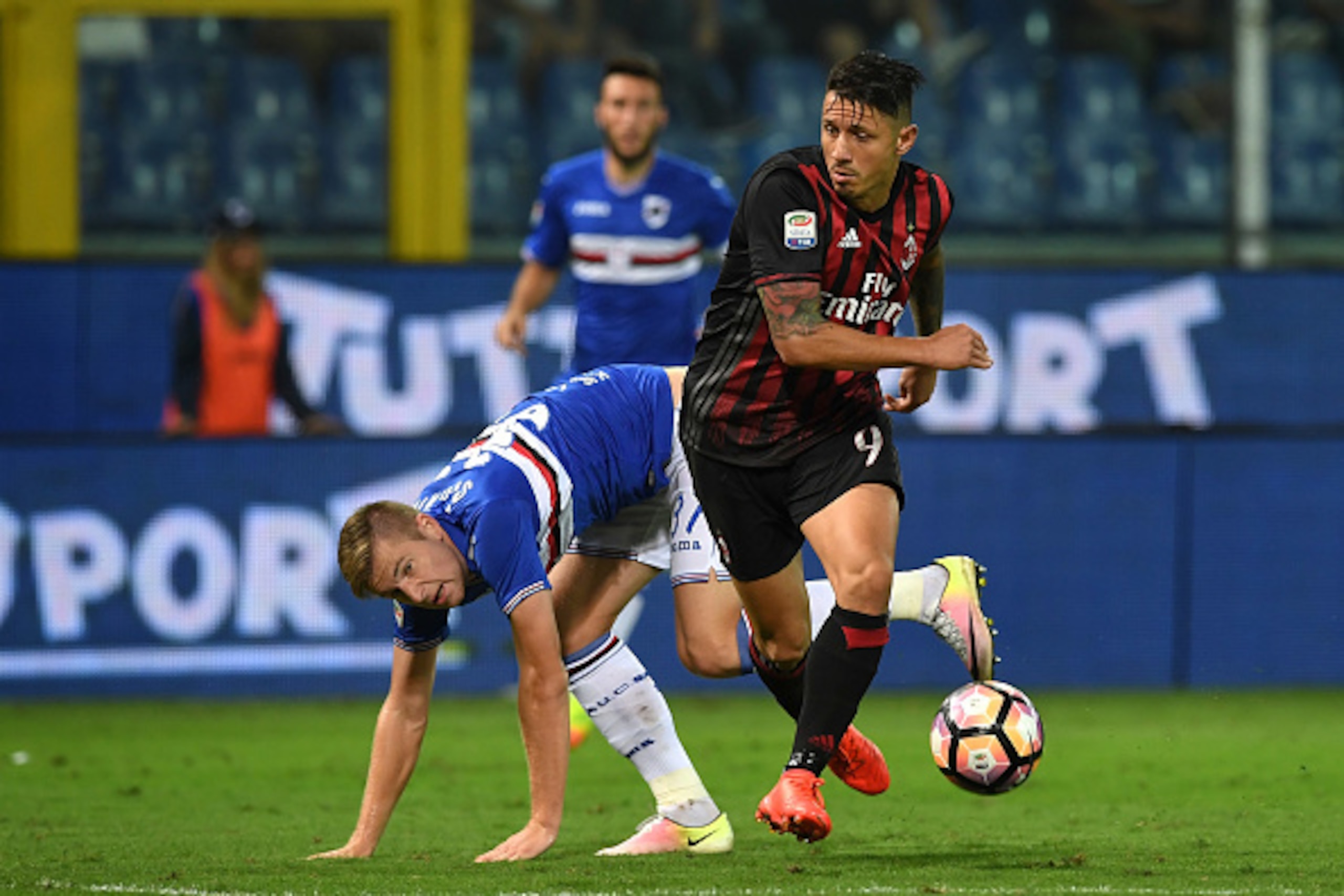 GENOA, ITALY - SEPTEMBER 16:  Milan Skriniar (L) of UC Sampdoria is tackled by Gianluca Lapadula of AC Milan during the Serie A match between UC Sampdoria and AC Milan at Stadio Luigi Ferraris on September 16, 2016 in Genoa, Italy.  (Photo by Valerio Penn